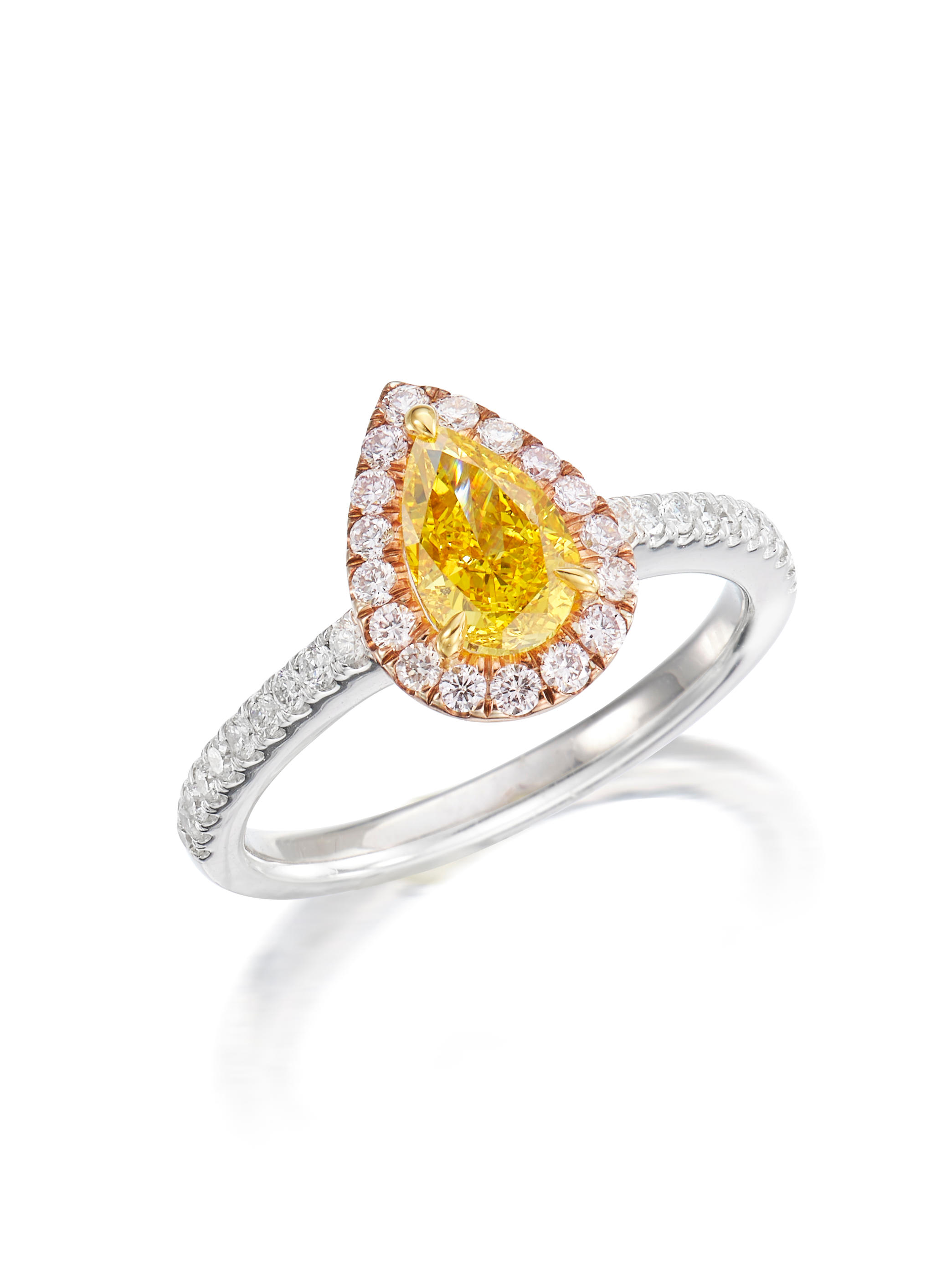 Appraisal: FANCY VIVID ORANGY YELLOW DIAMOND AND DIAMOND RING The pear-shaped