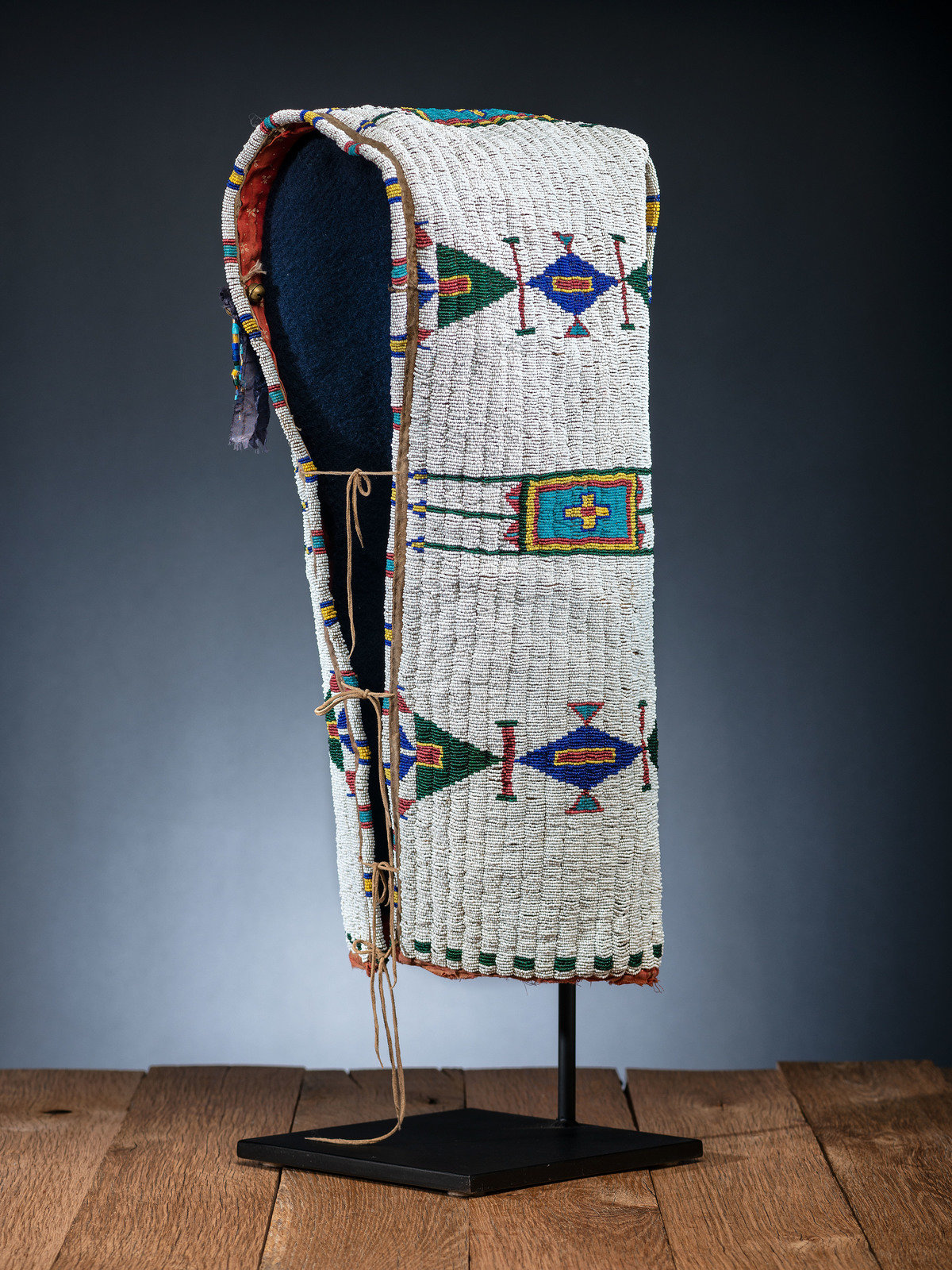 Appraisal: Sioux Beaded Hide Cradle late th century thread and sinew-sewn