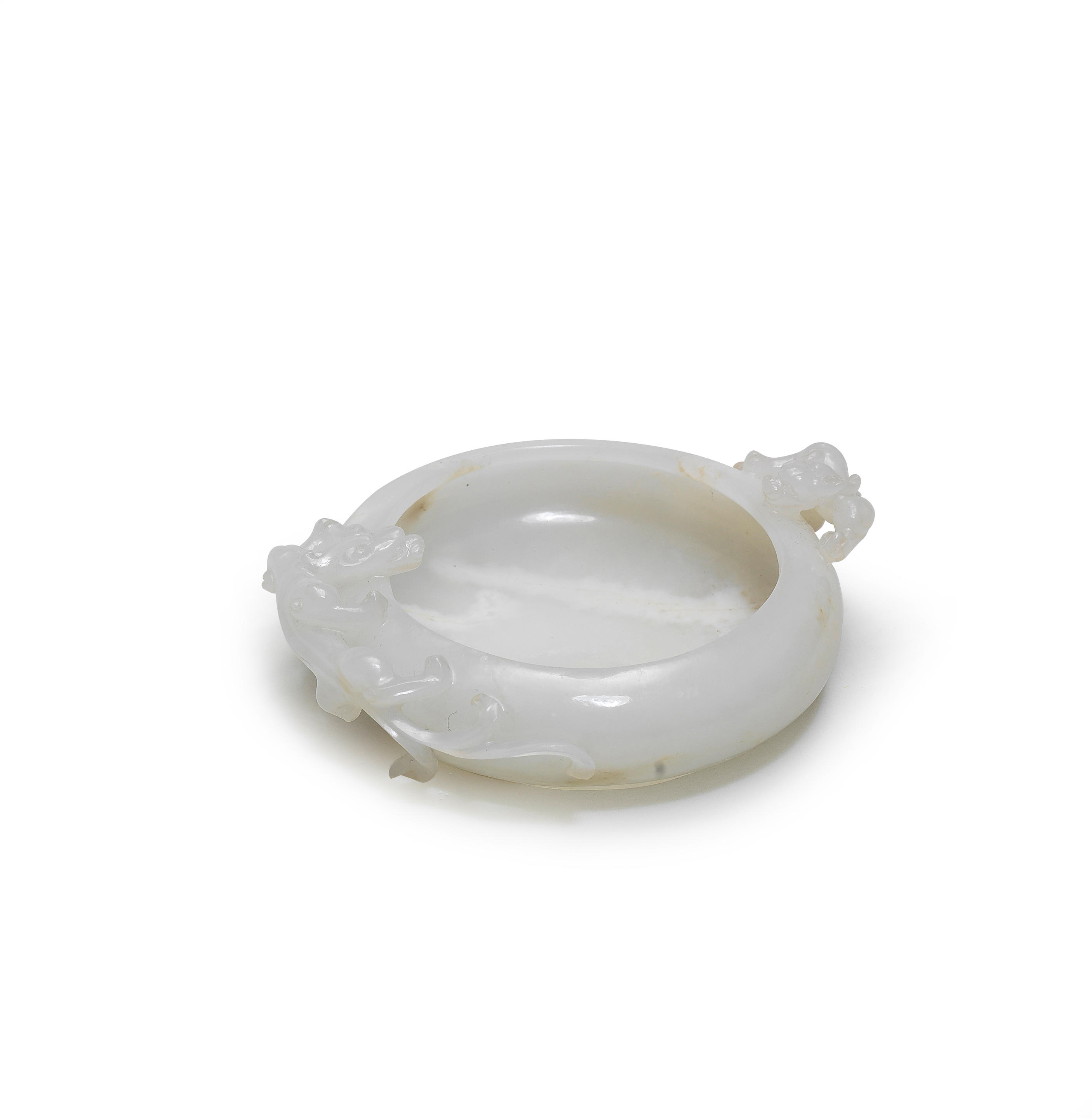 Appraisal: A FINE WHITE JADE 'CHILONG' BRUSHWASHER Qing Dynasty The compressed