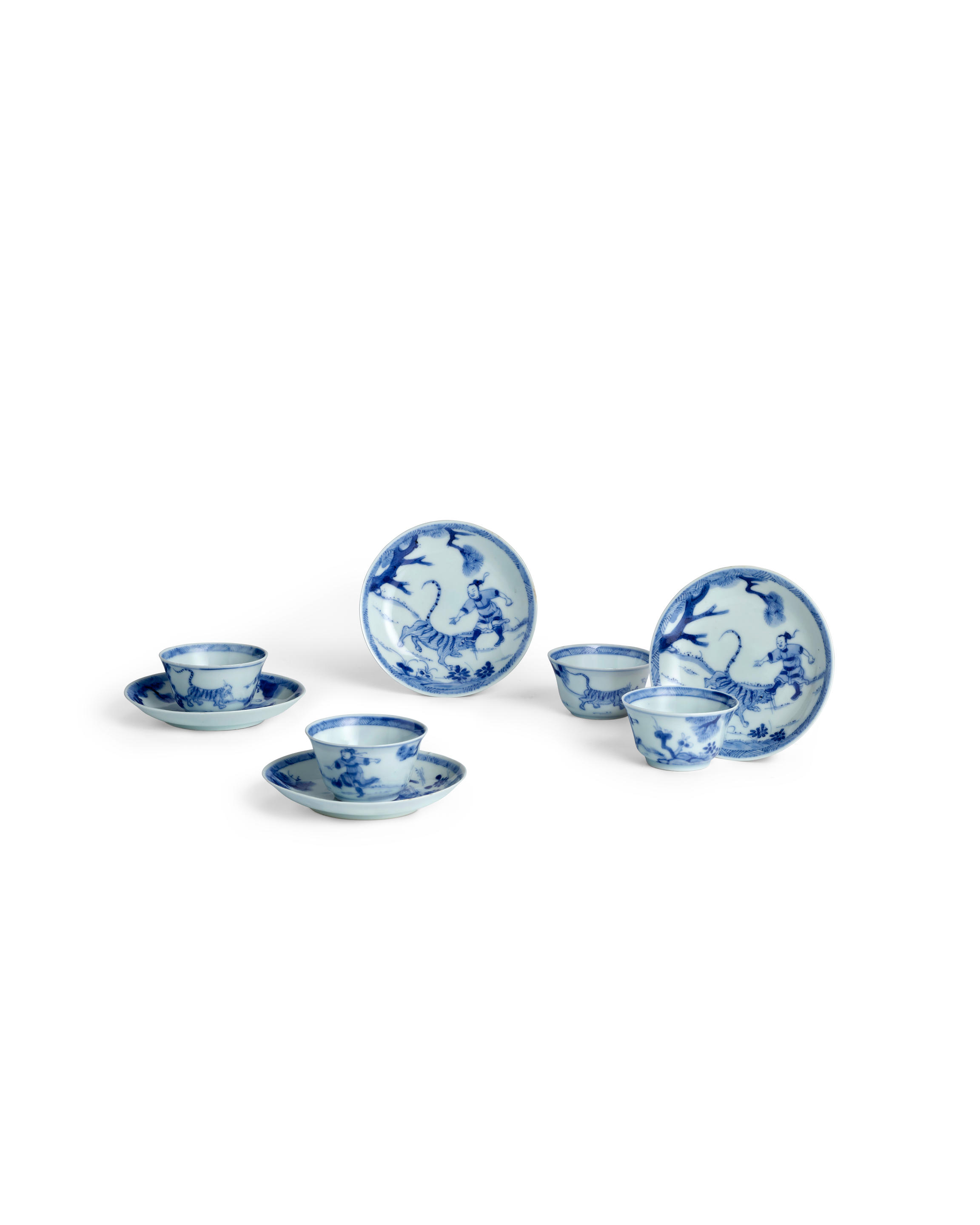 Appraisal: FOUR BLUE AND WHITE 'WUSONG AND TIGER' TEA BOWLS AND