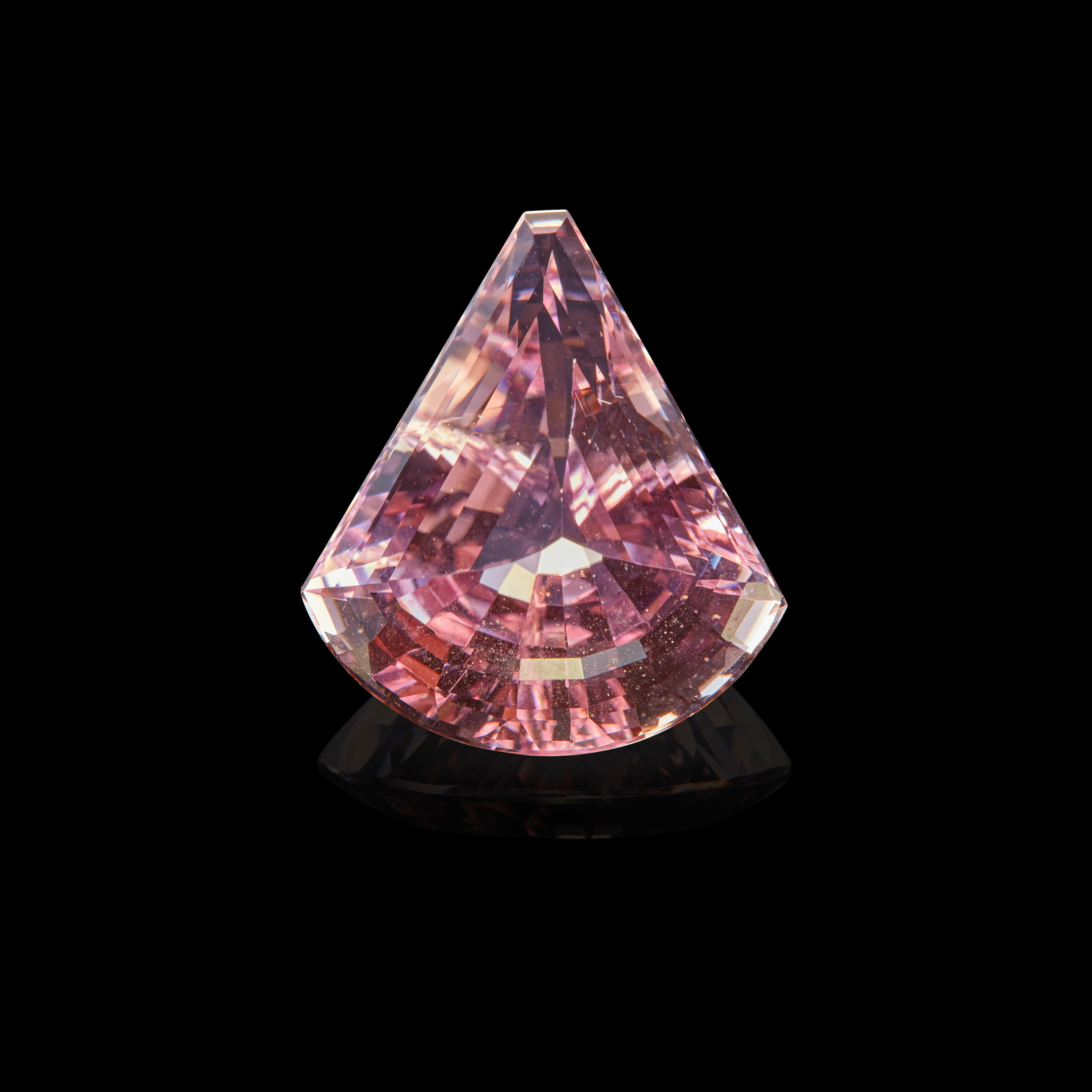 Appraisal: LARGE KUNZITE Brazil A large modified triangular-shaped kunzite with an