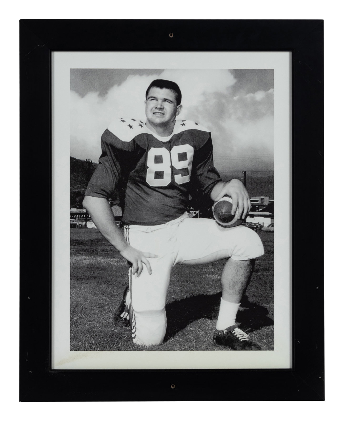 Appraisal: A Group of Six Photographs Depicting Mike Ditka as Chicago