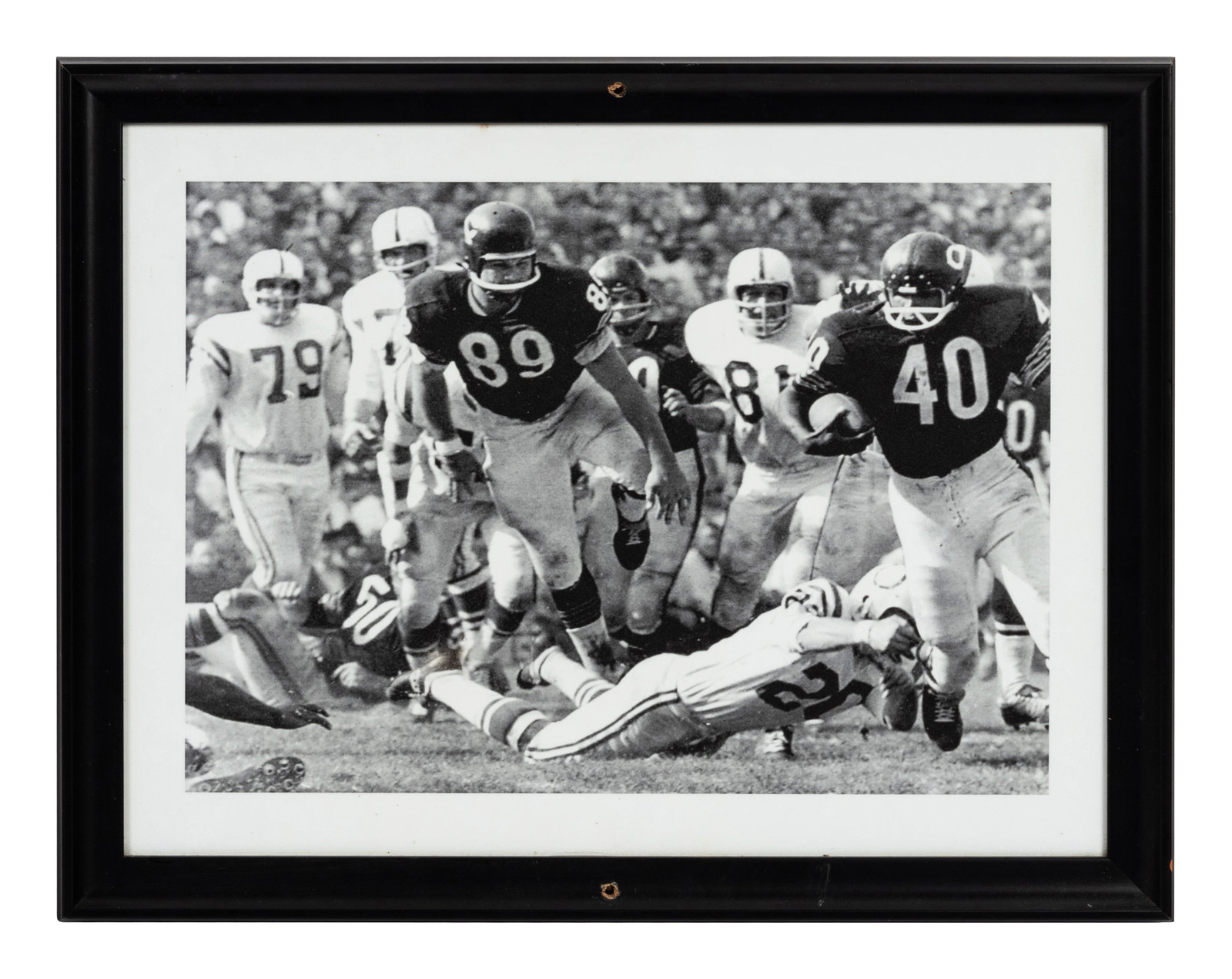 Appraisal: A Group of Three Photographs Depicting Gale Sayers Formerly Displayed