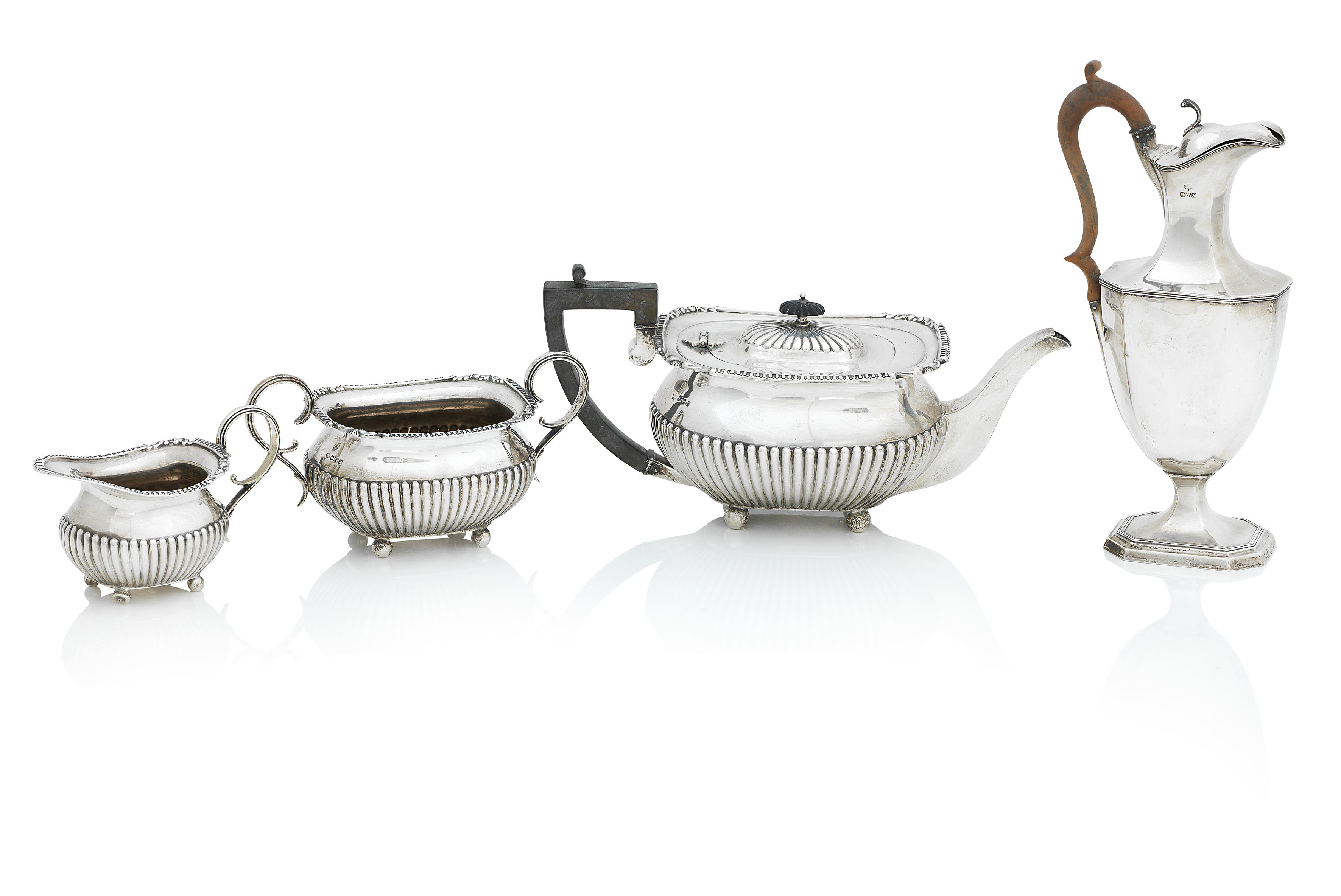 Appraisal: A GEORGE V THREE PIECE SILVER TEA SERVICE by Messrs