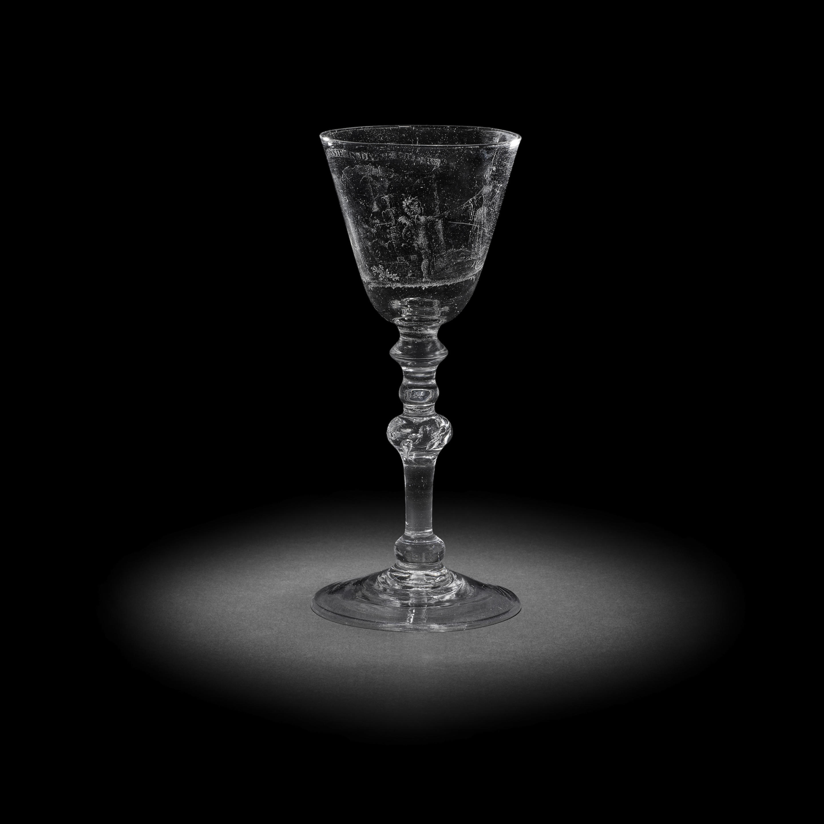 Appraisal: A FINE DUTCH STIPPLE-ENGRAVED LIGHT BALUSTER WINE GLASS ATTRIBUTED TO