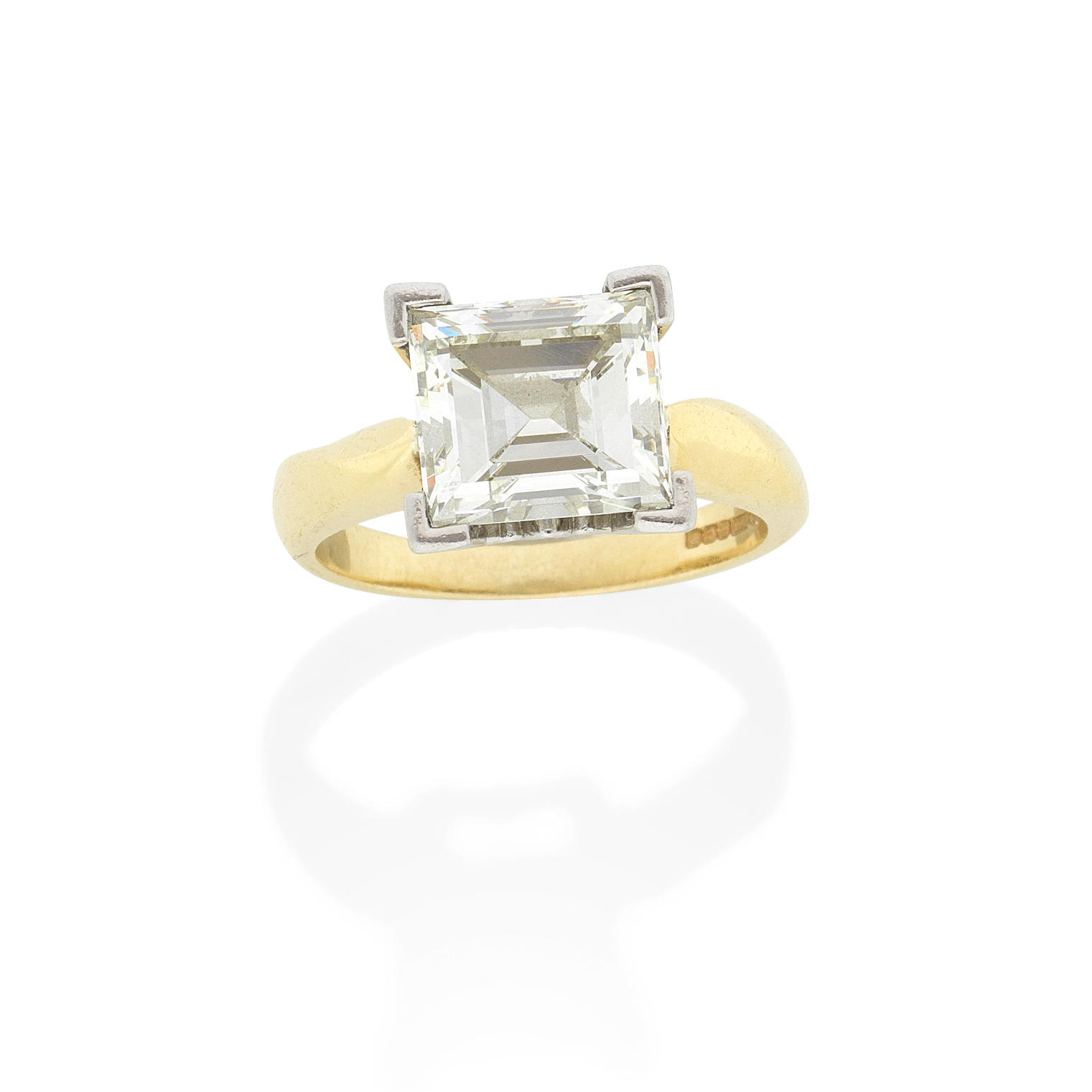 Appraisal: DIAMOND SINGLE-STONE RING The step-cut diamond weighing carats mounted in