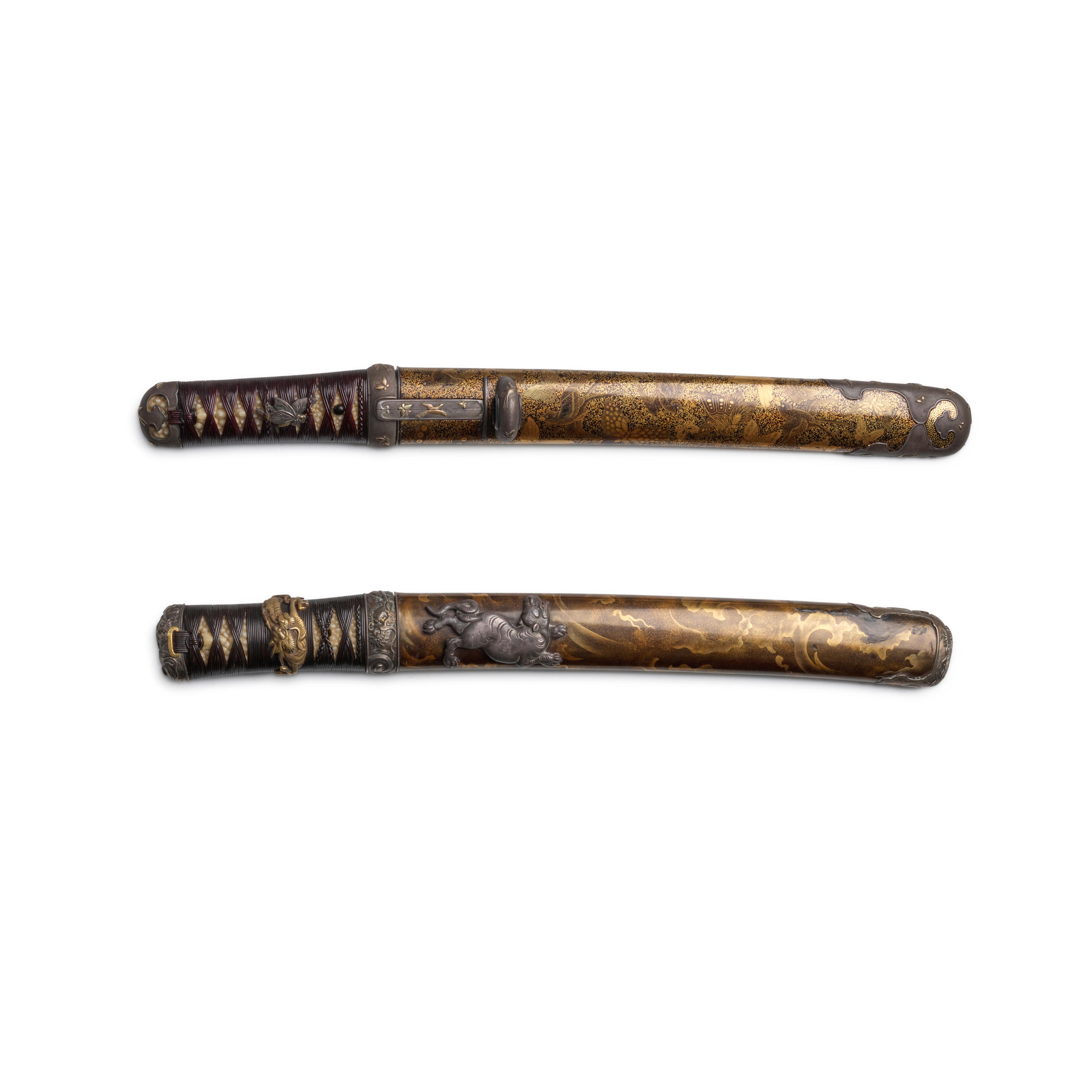 Appraisal: A GROUP OF TWO TANT DAGGERS IN AIKUCHI KOSHIRA-E GUARDLESS