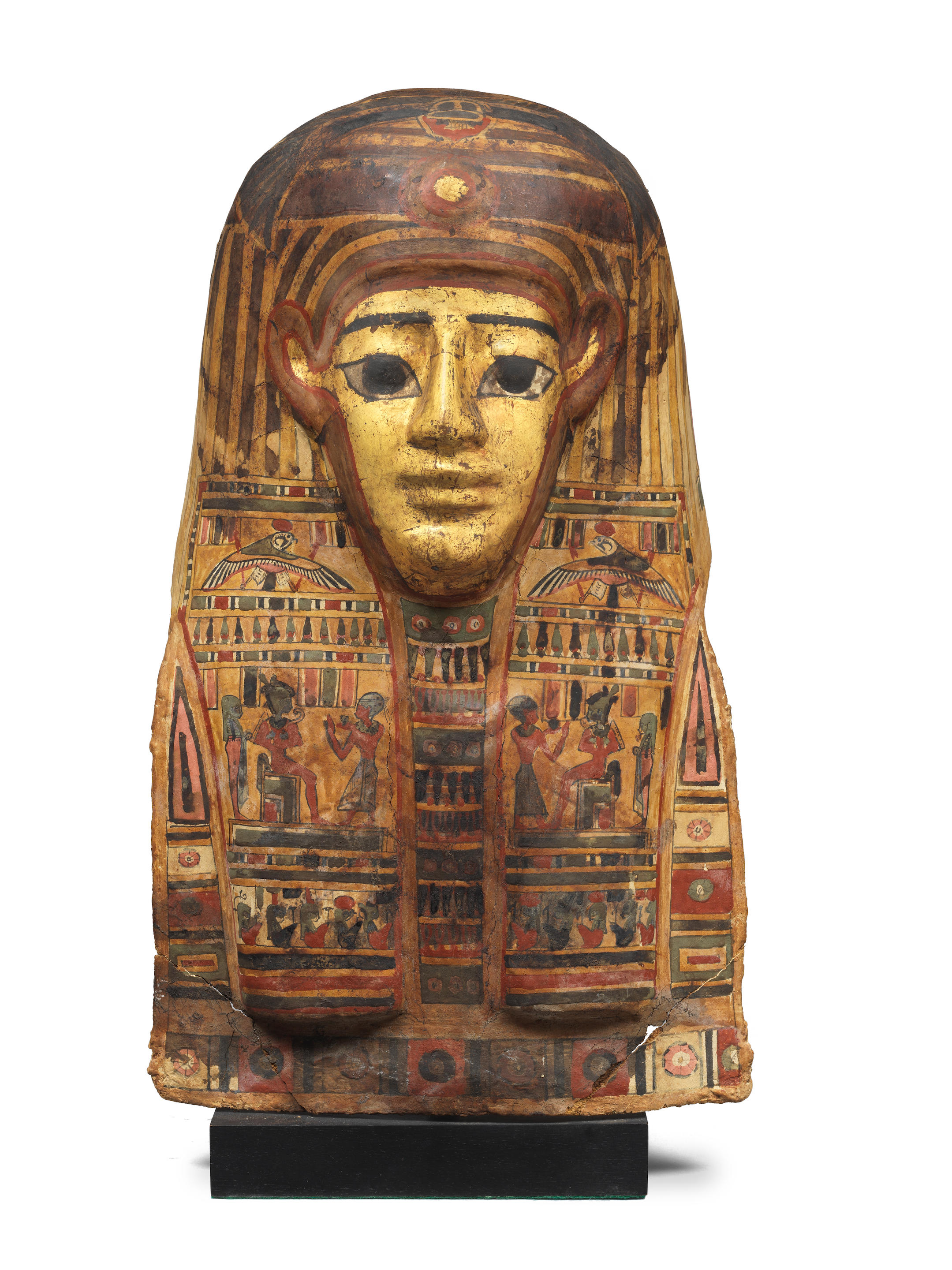 Appraisal: AN EGYPTIAN GILT POLYCHROME PAINTED CARTONNAGE MUMMY MASK An Egyptian