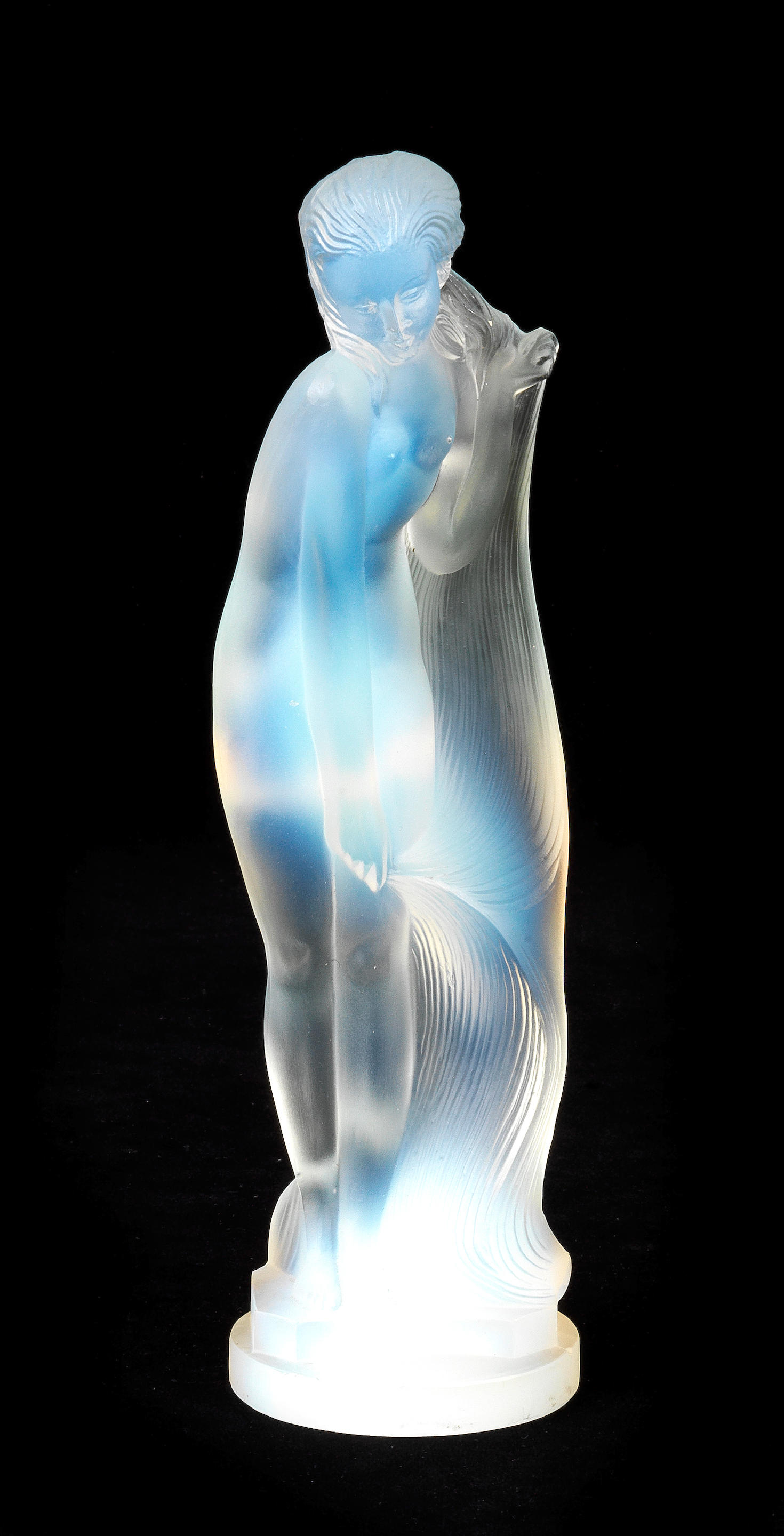 Appraisal: AN ART DECO 'NU LONGS CHEVEUX' MASCOT IN OPALESCENT GLASS