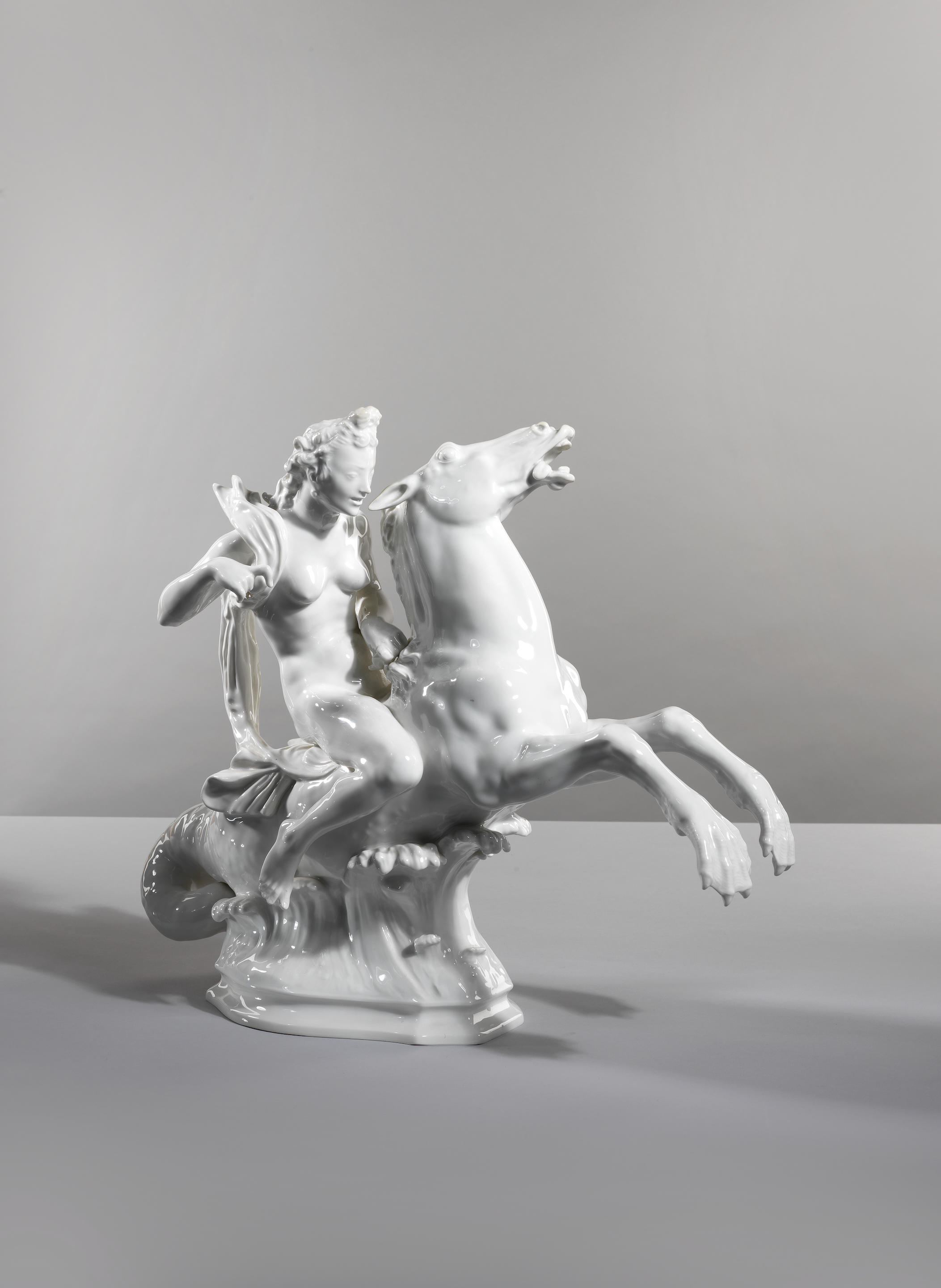 Appraisal: FIGURE EN PORCELAINE BLANCHE REPR SENTANT UNE NA ADE CHEVAUCHANT