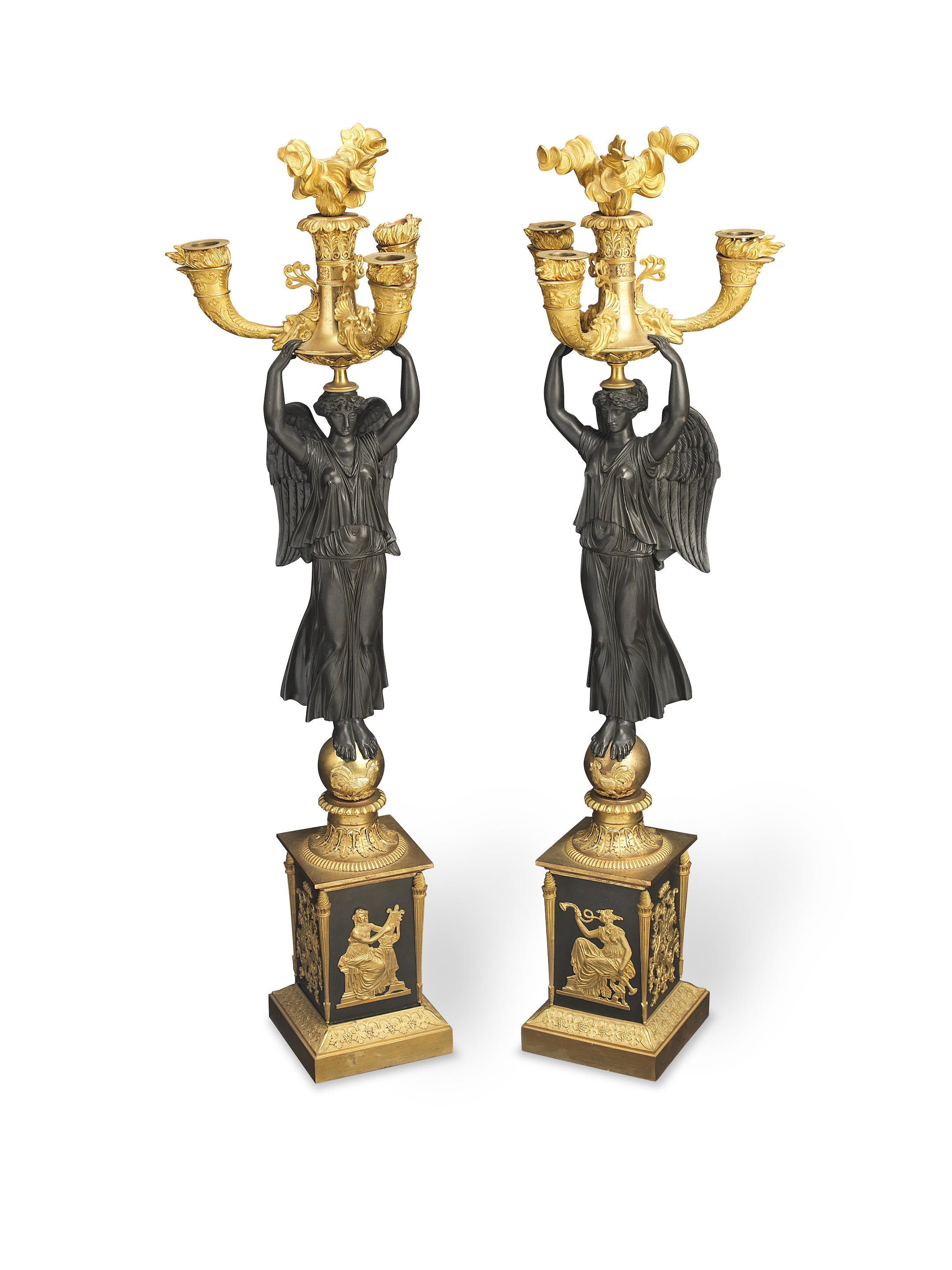 Appraisal: A PAIR OF FRENCH EMPIRE GILT AND PATINATED BRONZE THREE