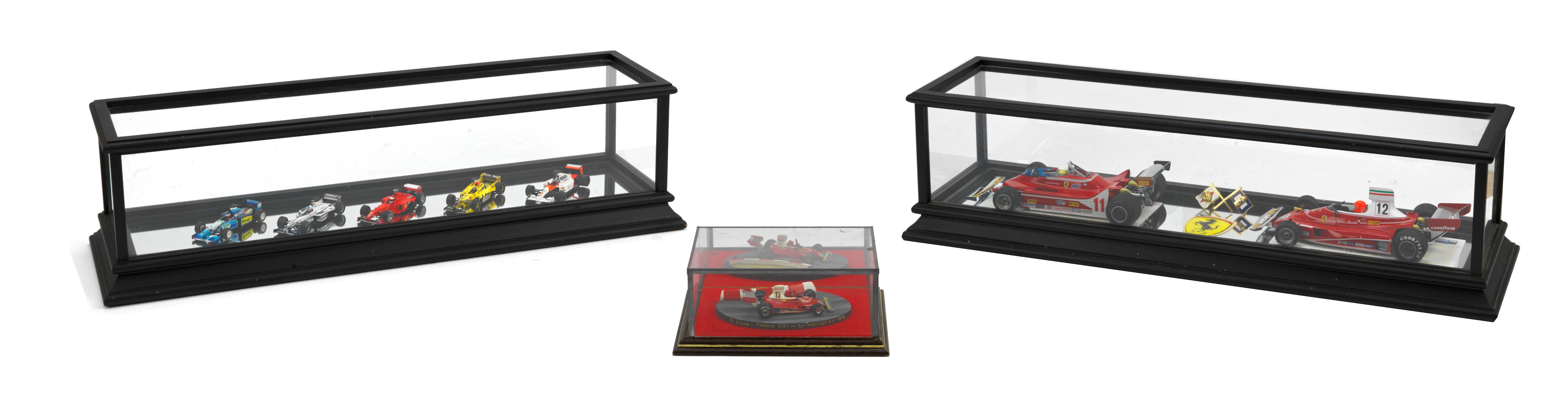 Appraisal: A CASED DISPLAY OF TWO SCALE NIKI LAUDA AND JODY