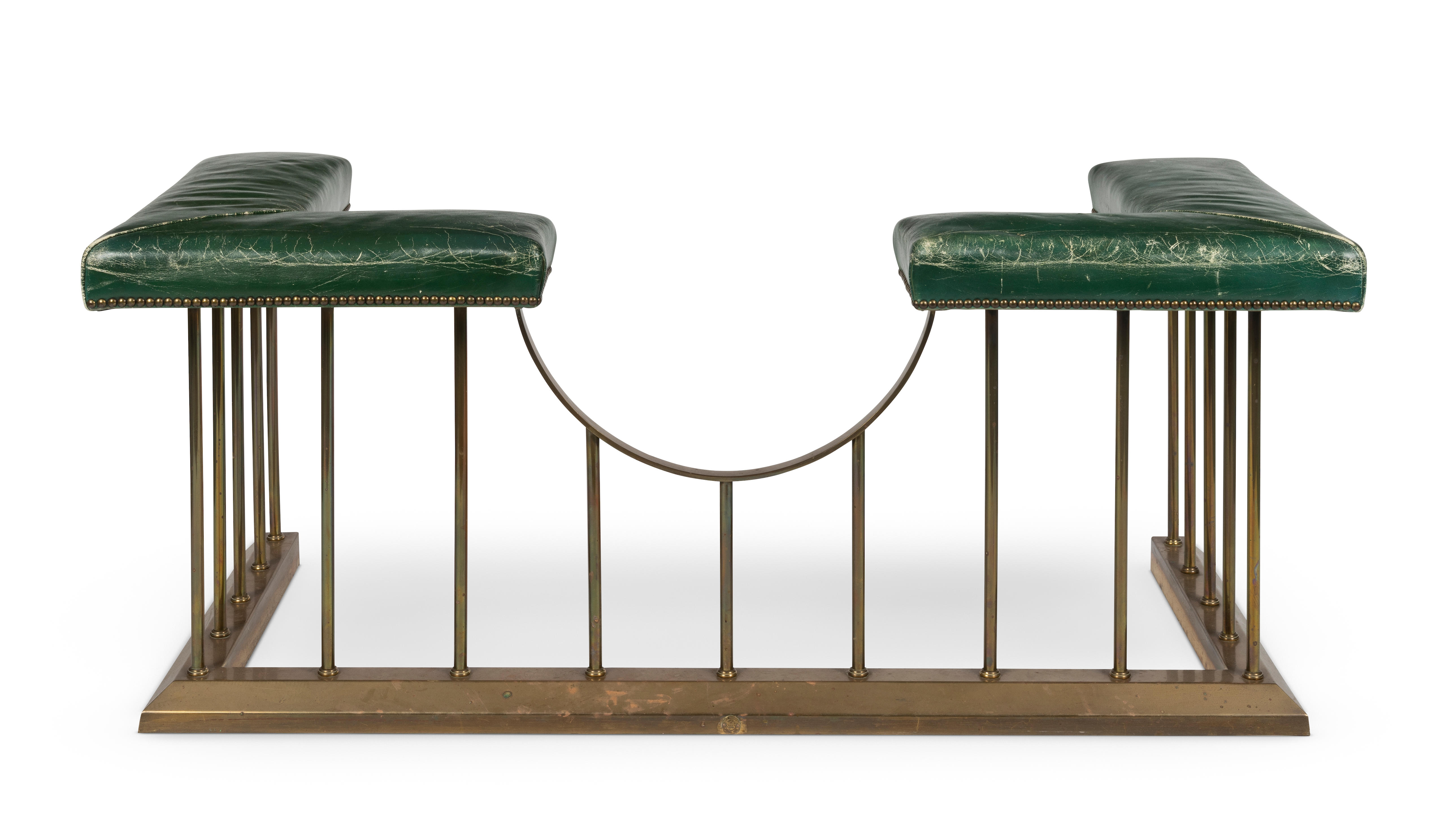 Appraisal: A BRASS AND GREEN LEATHER UPHOLSTERED CLUB FENDER Of typical