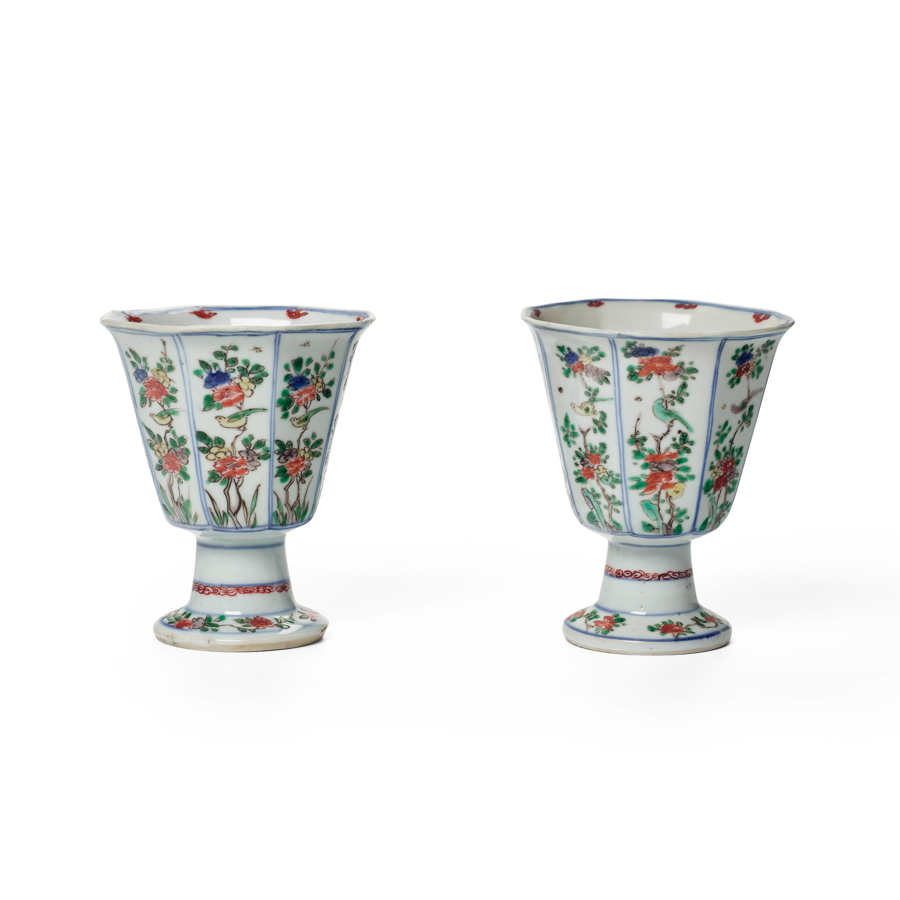 Appraisal: A PAIR OF FAMILLE VERTE TAPERING OCTAGONAL STEM CUPS Kangxi