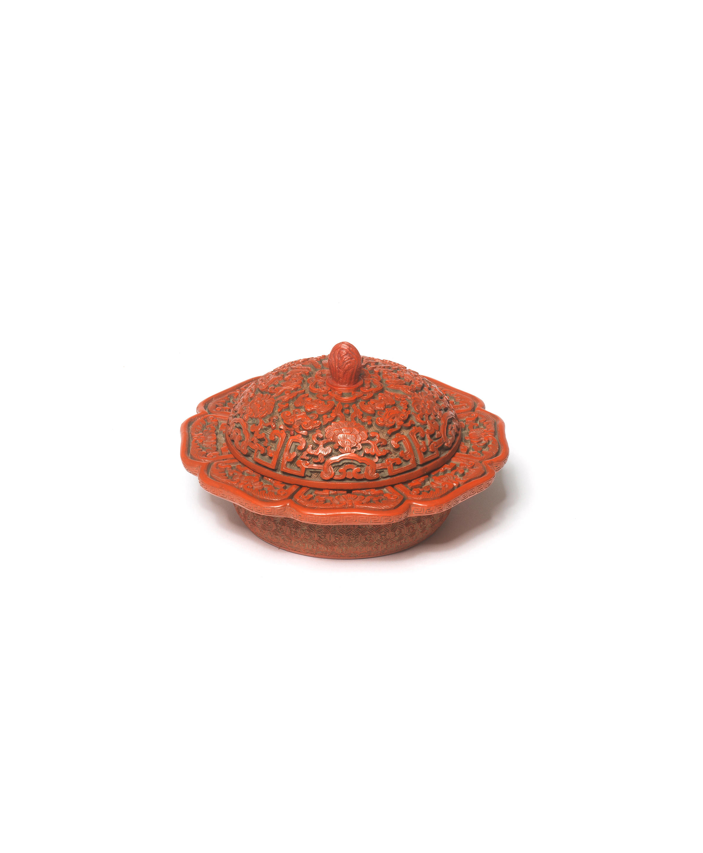 Appraisal: A CARVED CINNABAR LACQUER LOBED BOWL AND COVER ZHADOU Qianlong