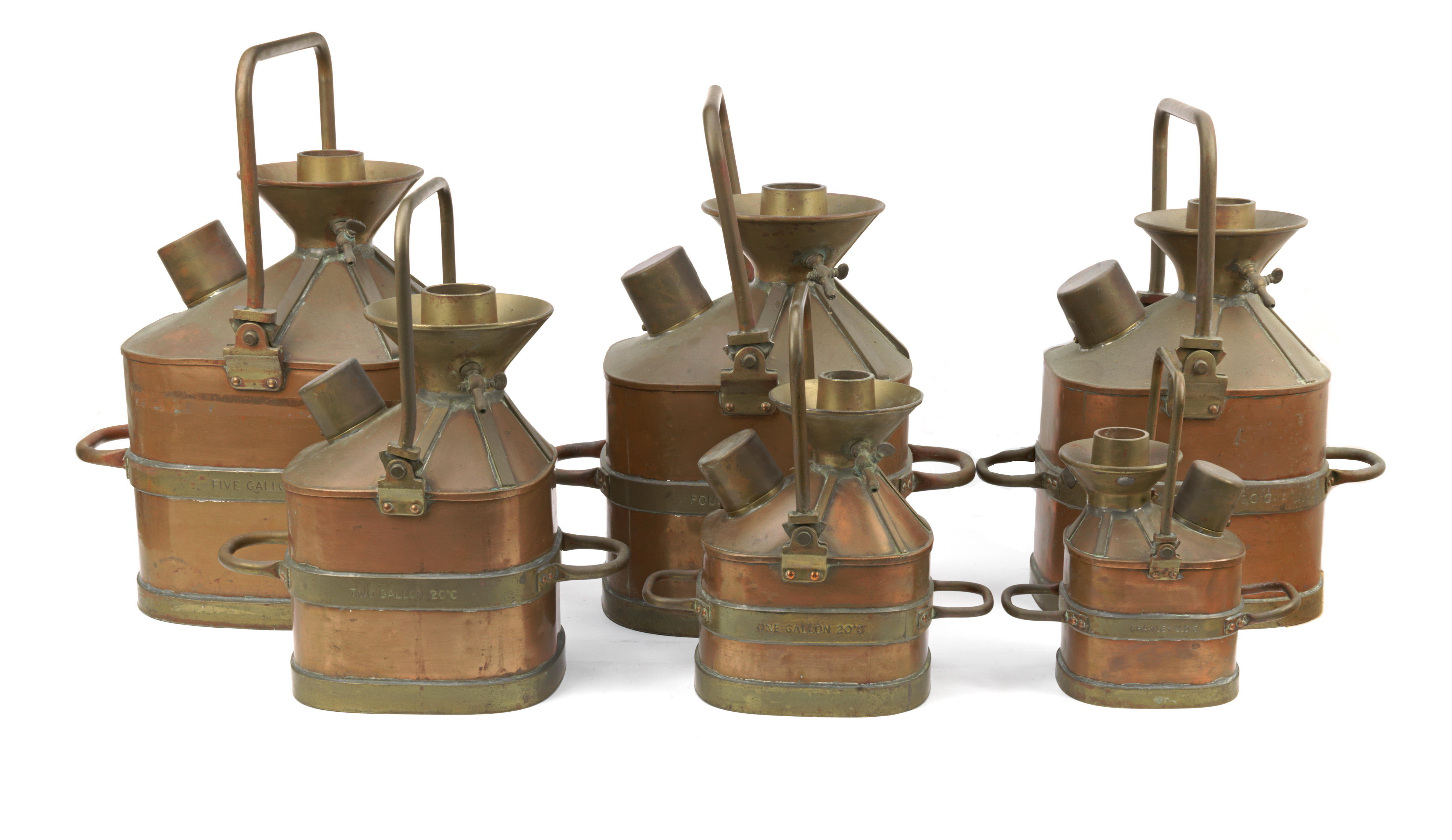 Appraisal: A SET OF SIX COPPER AND BRASS 'CHEKPUMP' IMPERIAL PETROL