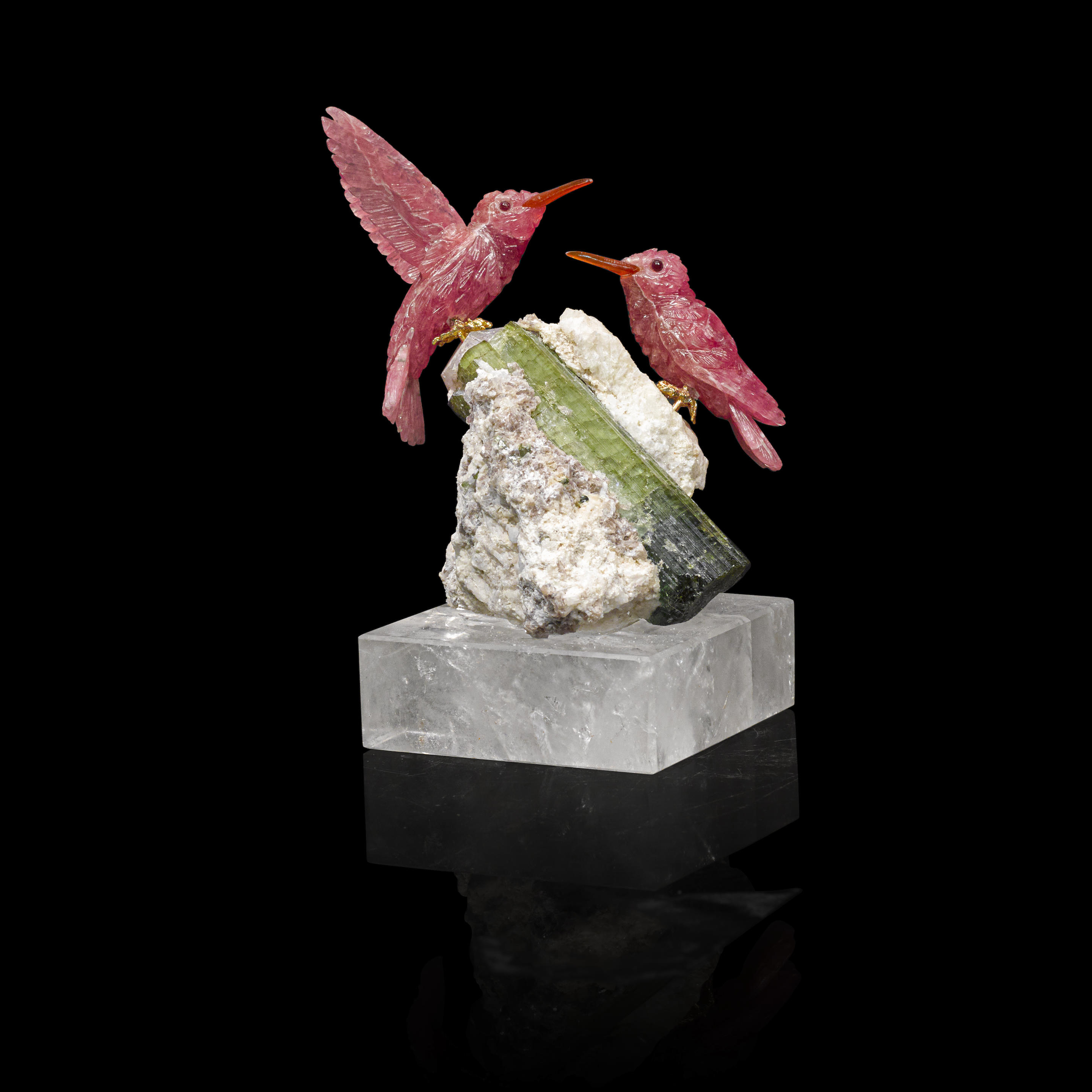 Appraisal: RHODOCHROSITE CARVING OF A HUMMINGBIRD BY PETER MULLER The diminutive