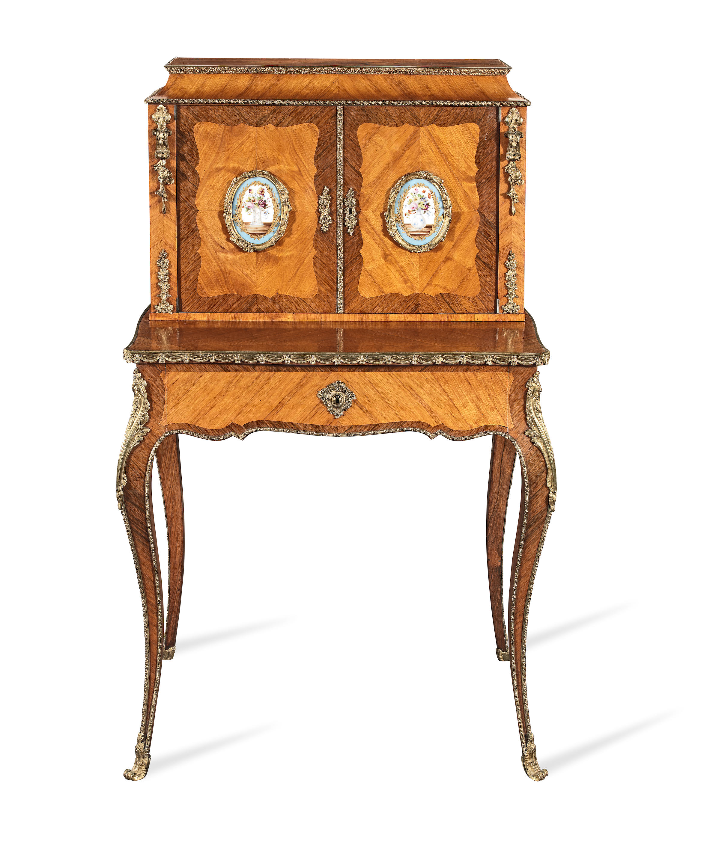 Appraisal: A NAPOLEON III PORCELAIN AND ORMOLU MOUNTED TULIPWOOD AND ROSEWOOD