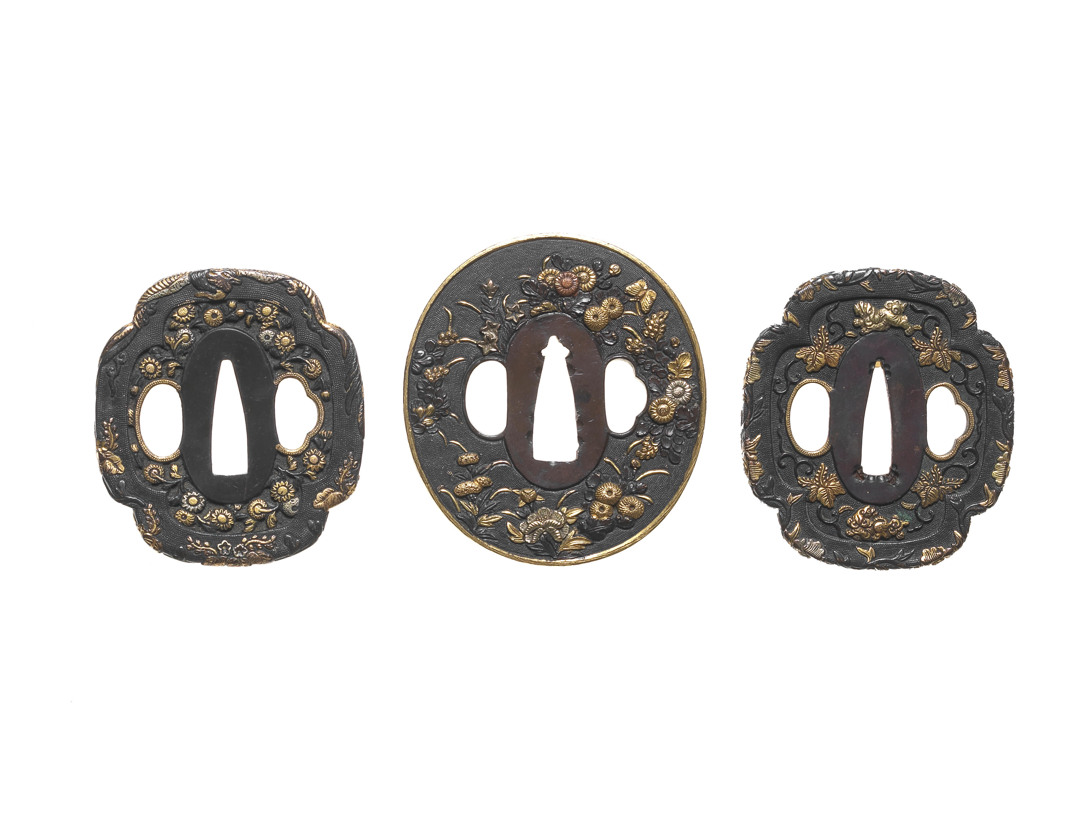 Appraisal: THREE TSUBA HAND GUARDS Edo period - th century All