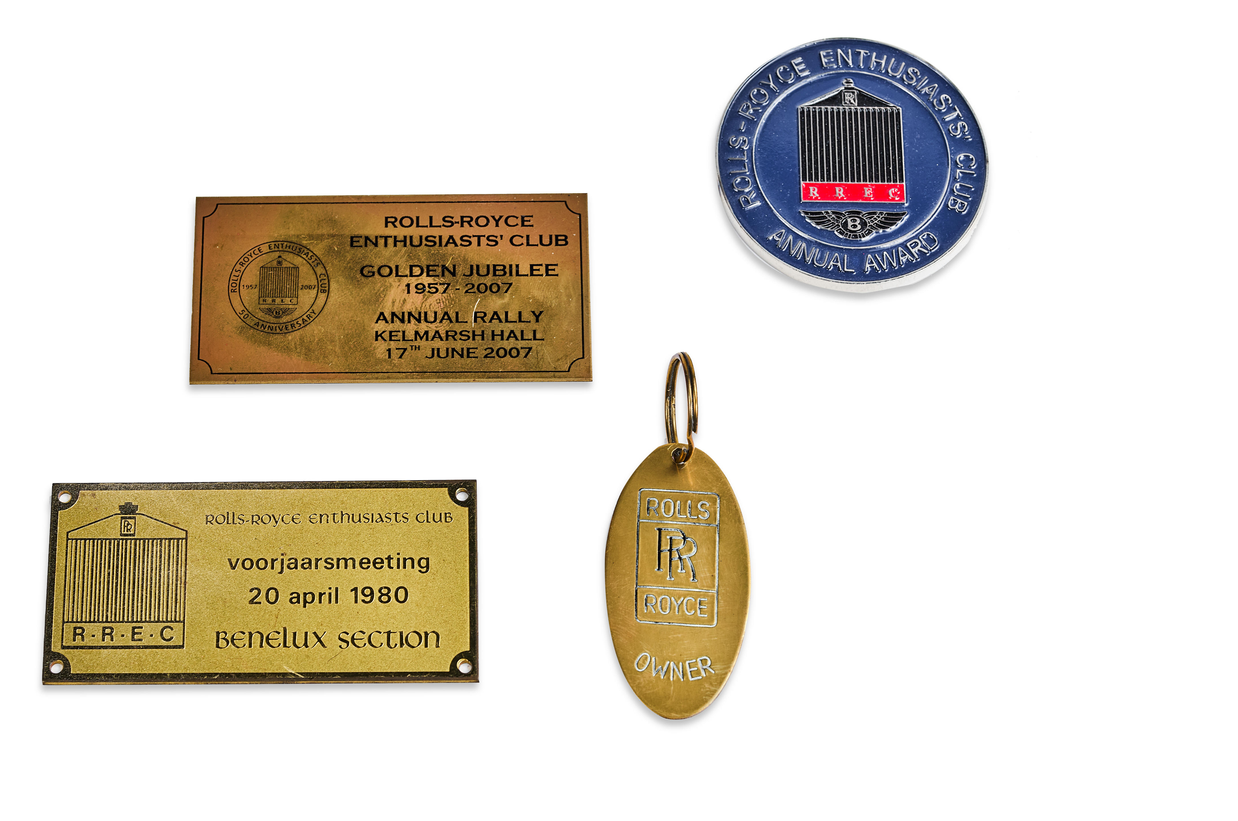 Appraisal: TWO ROLLS-ROYCE PLAQUES AN AWARD AND A KEY RING Rolls-Royce