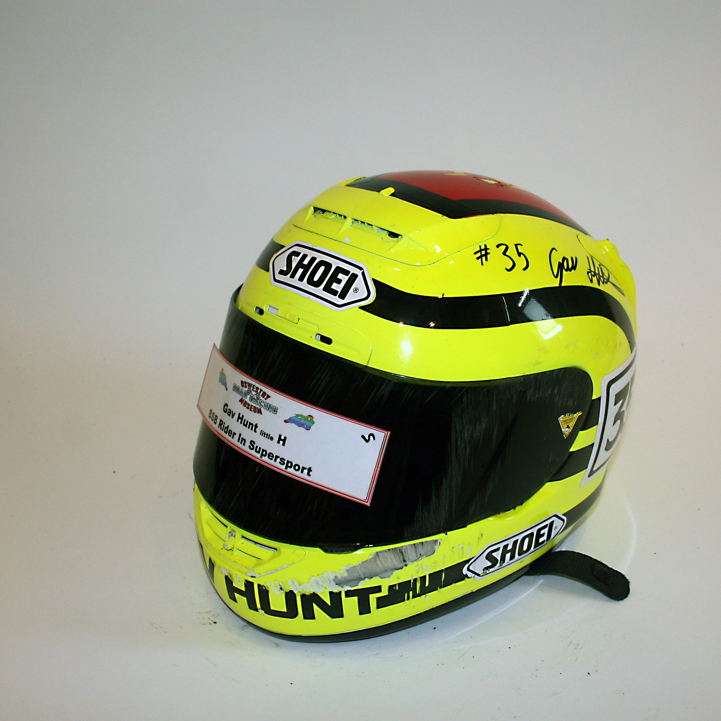 Appraisal: GAV HUNT A SIGNED FULL-FACE HELMET BY SHOEI used and