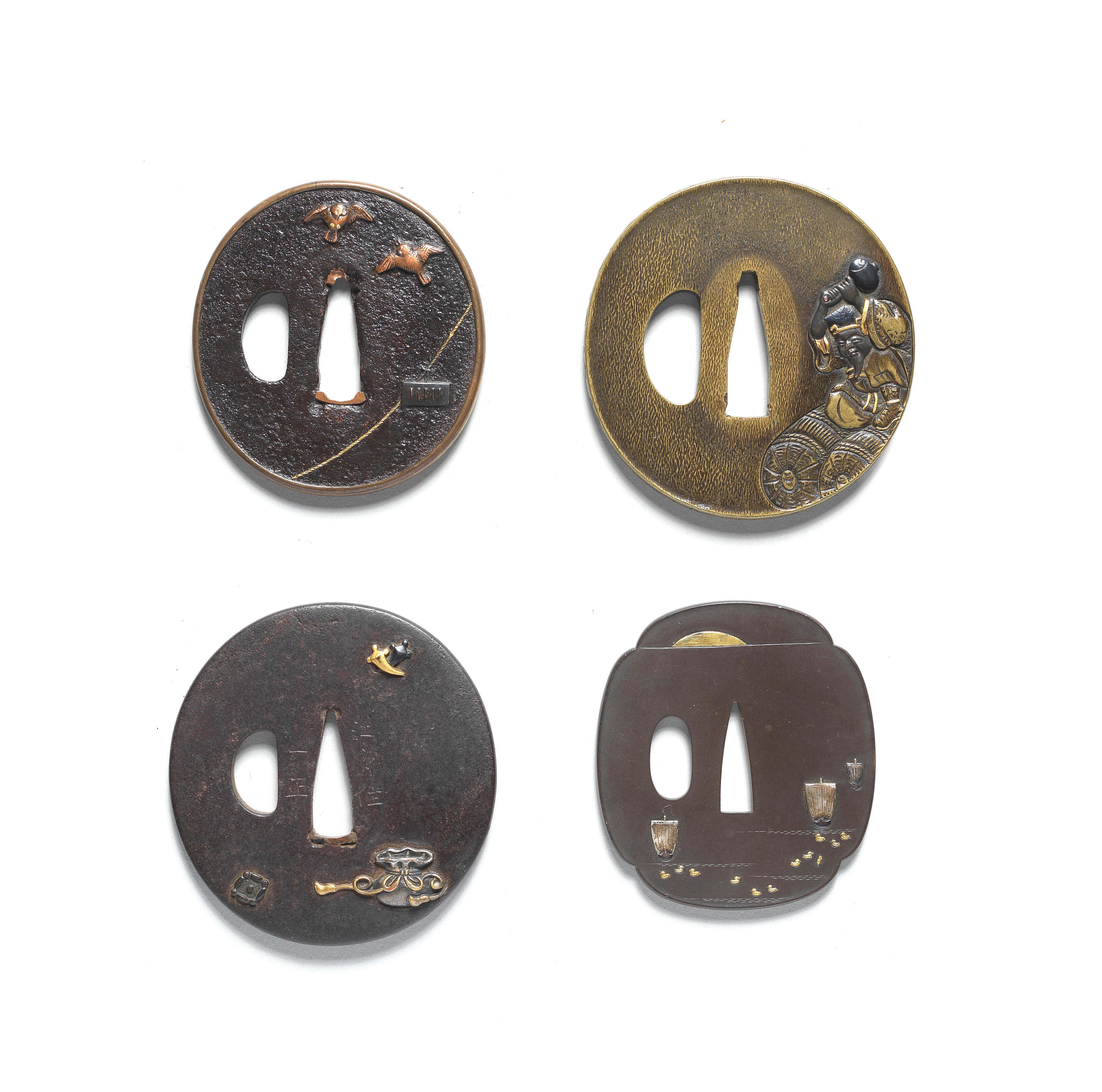 Appraisal: FOUR TSUBA HAND GUARDS Edo period - th to th