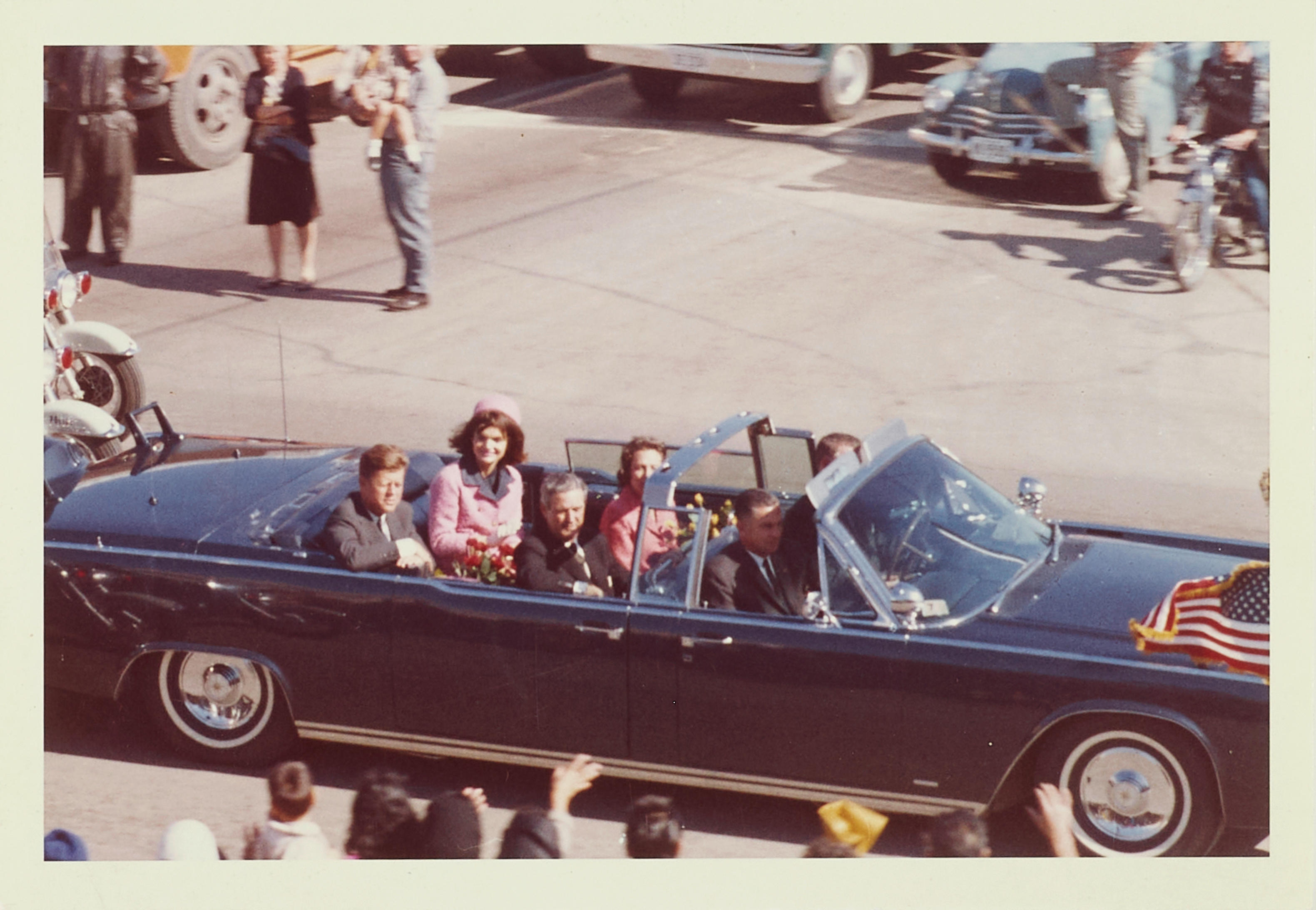 Appraisal: THE DALLAS MOTORCADE A collection of photographs and negatives images