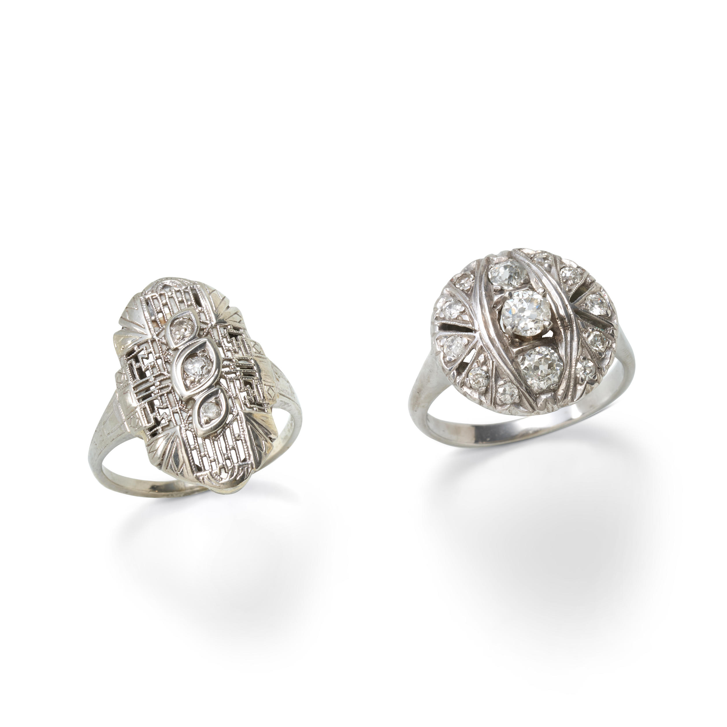 Appraisal: TWO ART DECO WHITE GOLD AND DIAMOND RINGS Each set