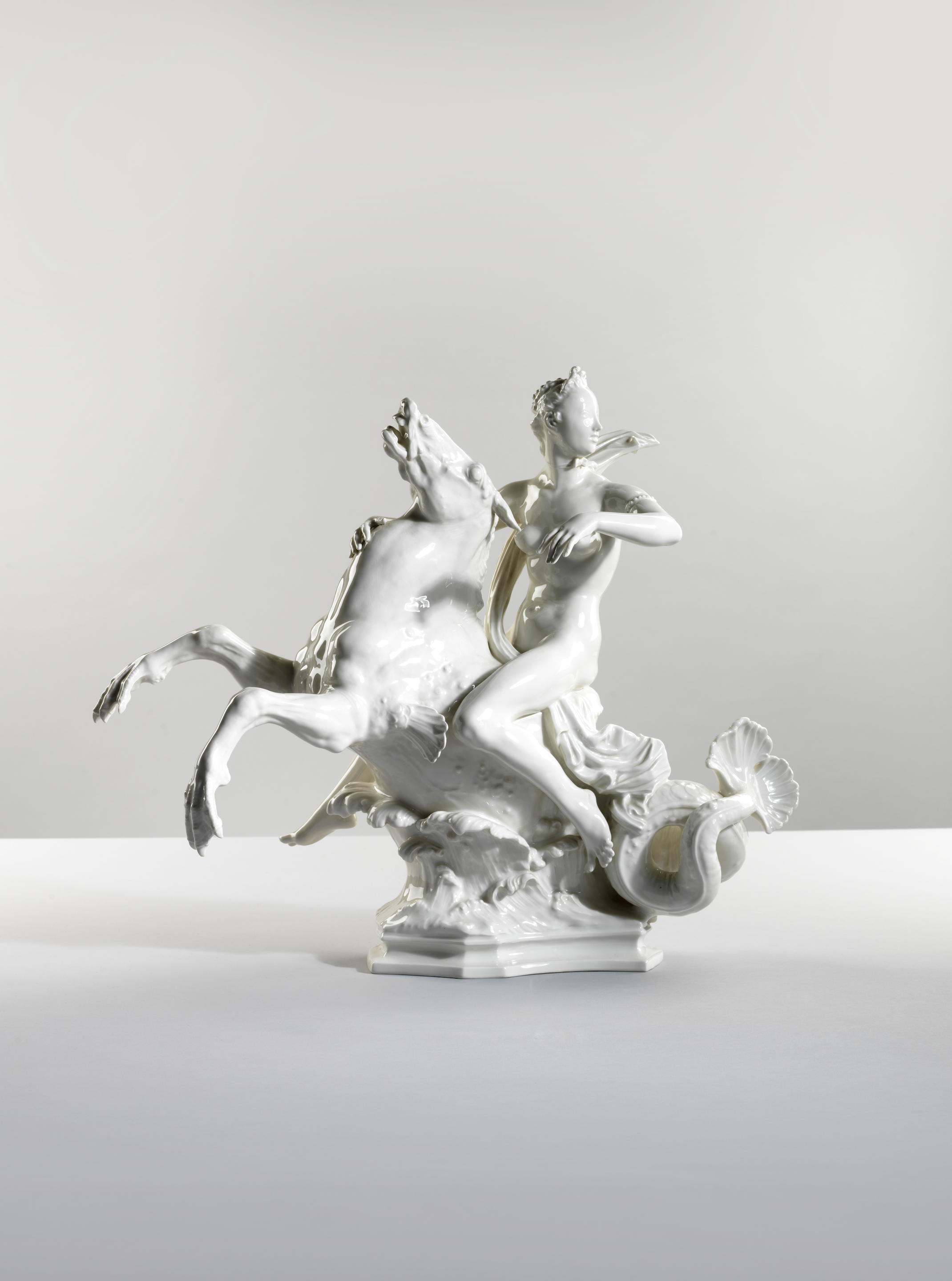 Appraisal: FIGURE EN PORCELAINE BLANCHE REPR SENTANT UNE NA ADE CHEVAUCHANT