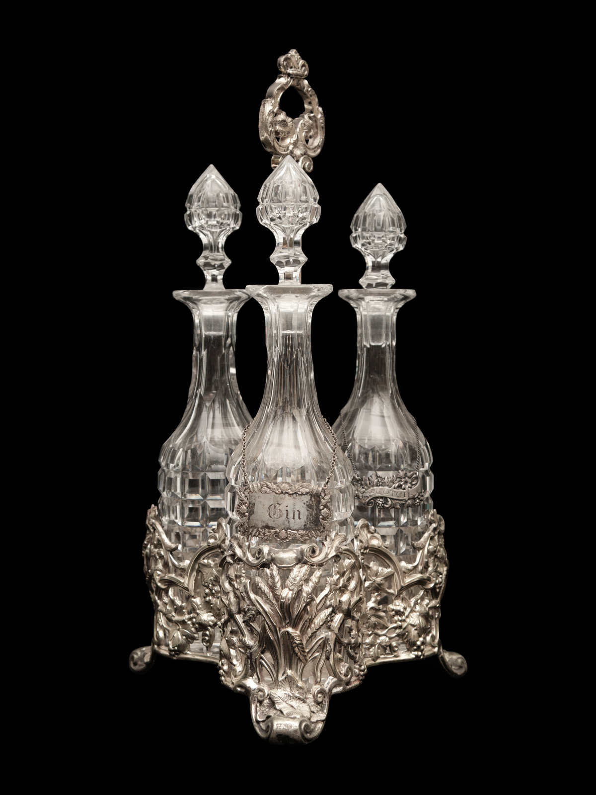 Appraisal: An English Silver-Plate Tantalus with Three Cut Glass Decanters th