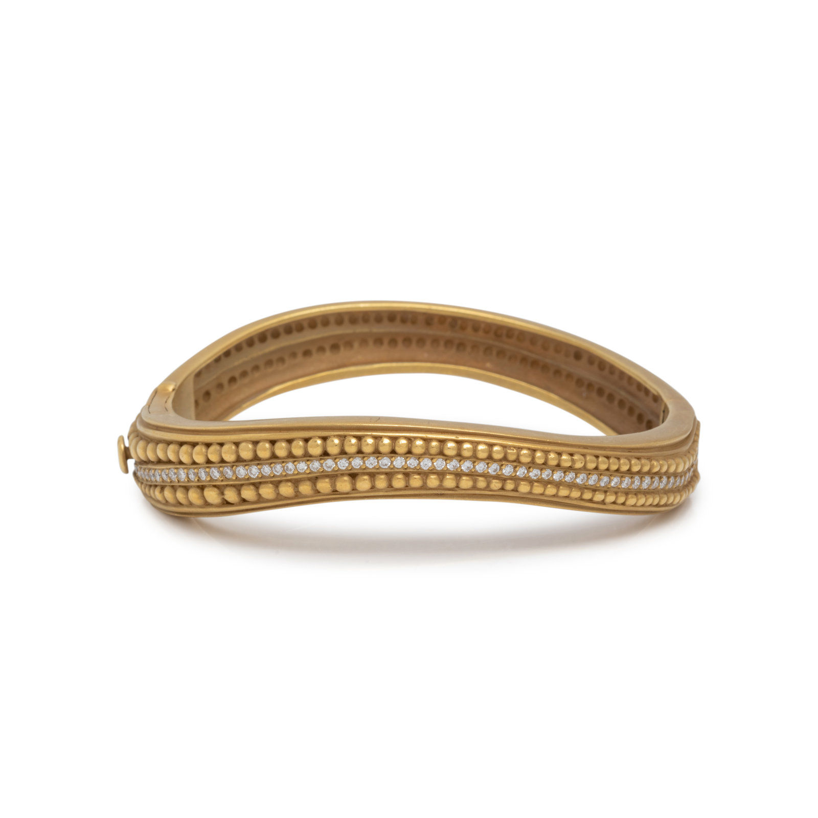 Appraisal: KIESELSTEIN-CORD YELLOW GOLD AND DIAMOND BANGLE BRACELET In a curved