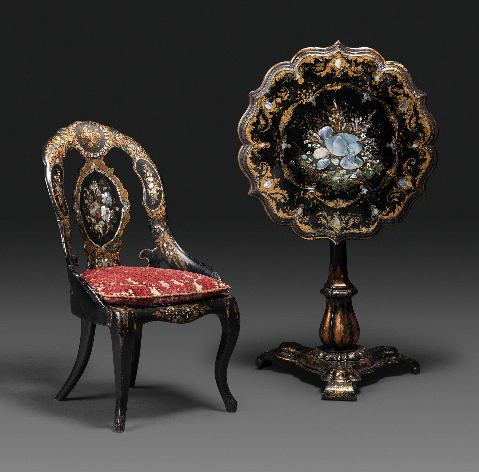 Appraisal: A Victorian Parcel-Gilt and Black Lacquered Mother-of-Pearl Inlaid Side Table