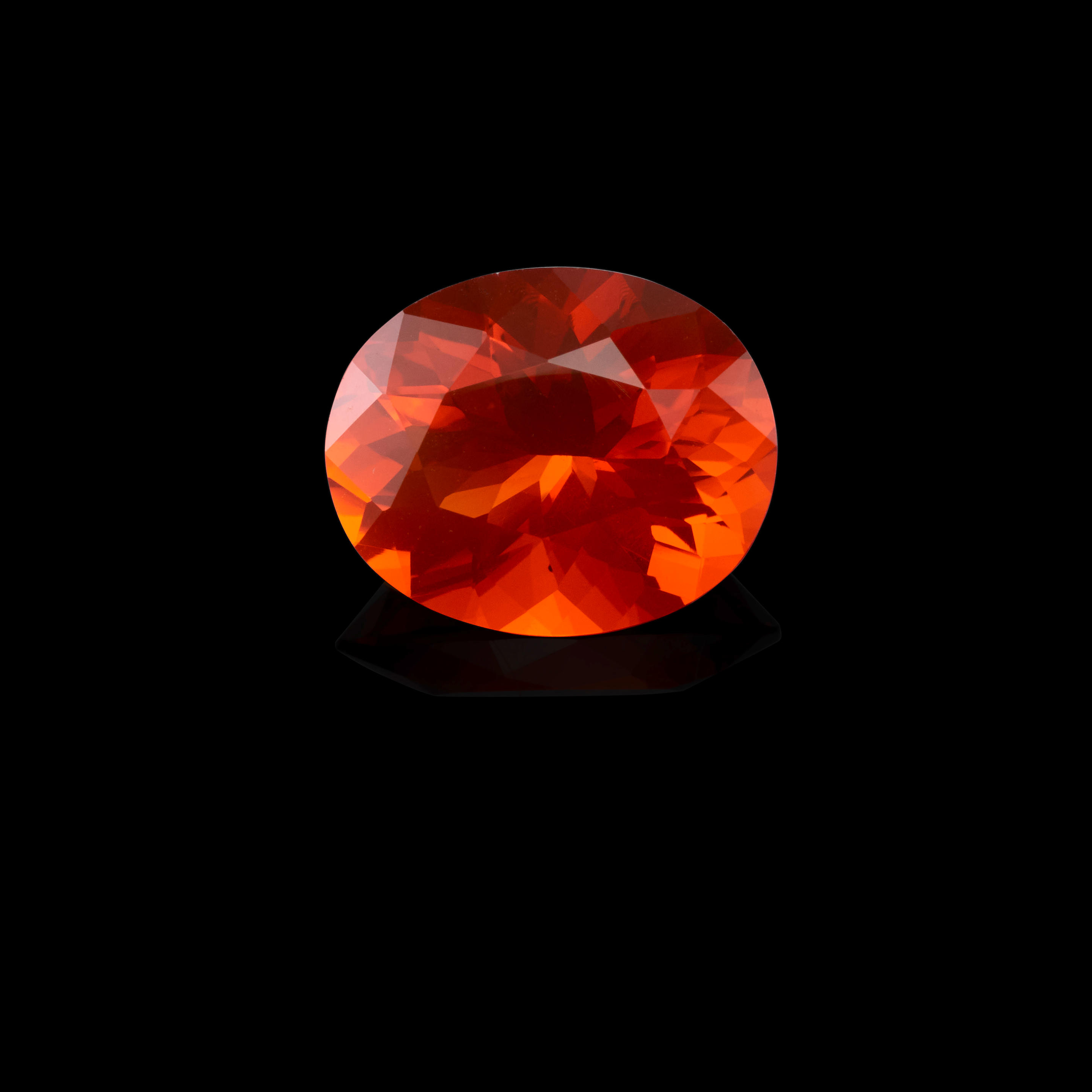 Appraisal: FIRE OPAL Mexico An oval-cut fire opal having a vivid