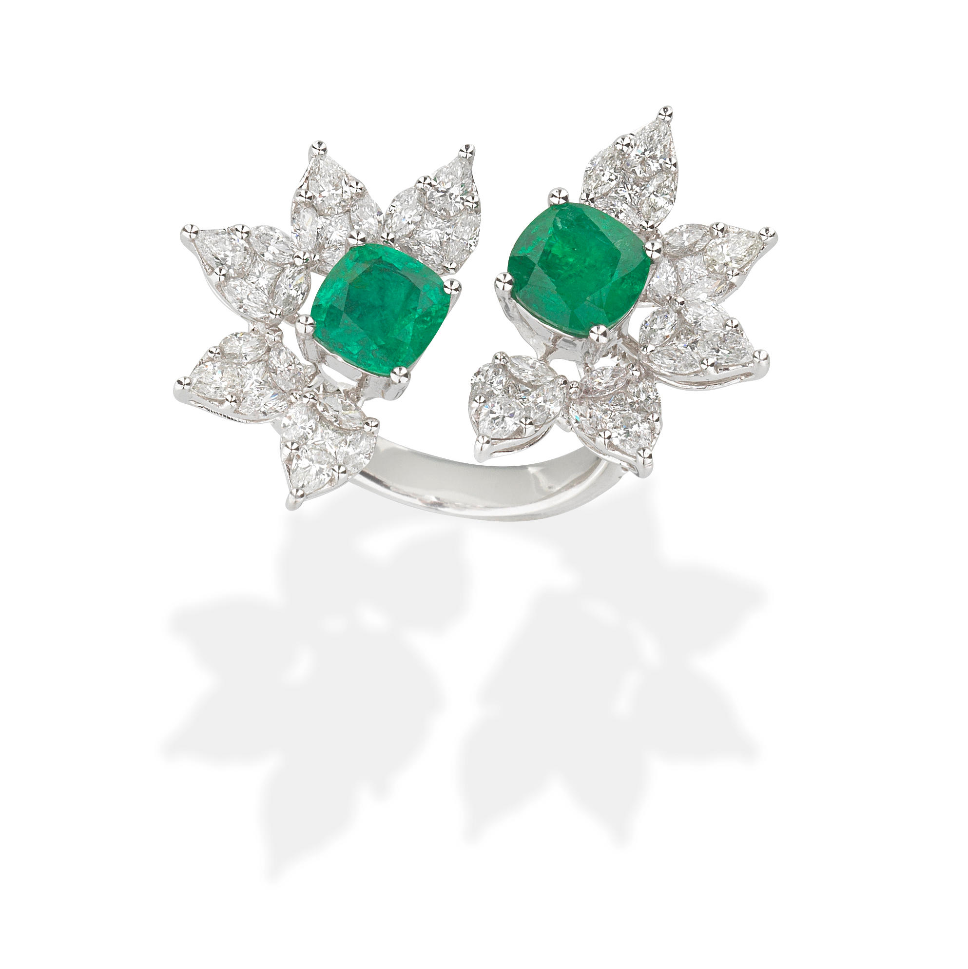 Appraisal: EMERALD AND DIAMOND RING Cushion-shaped emeralds marquise pear and princess-cut