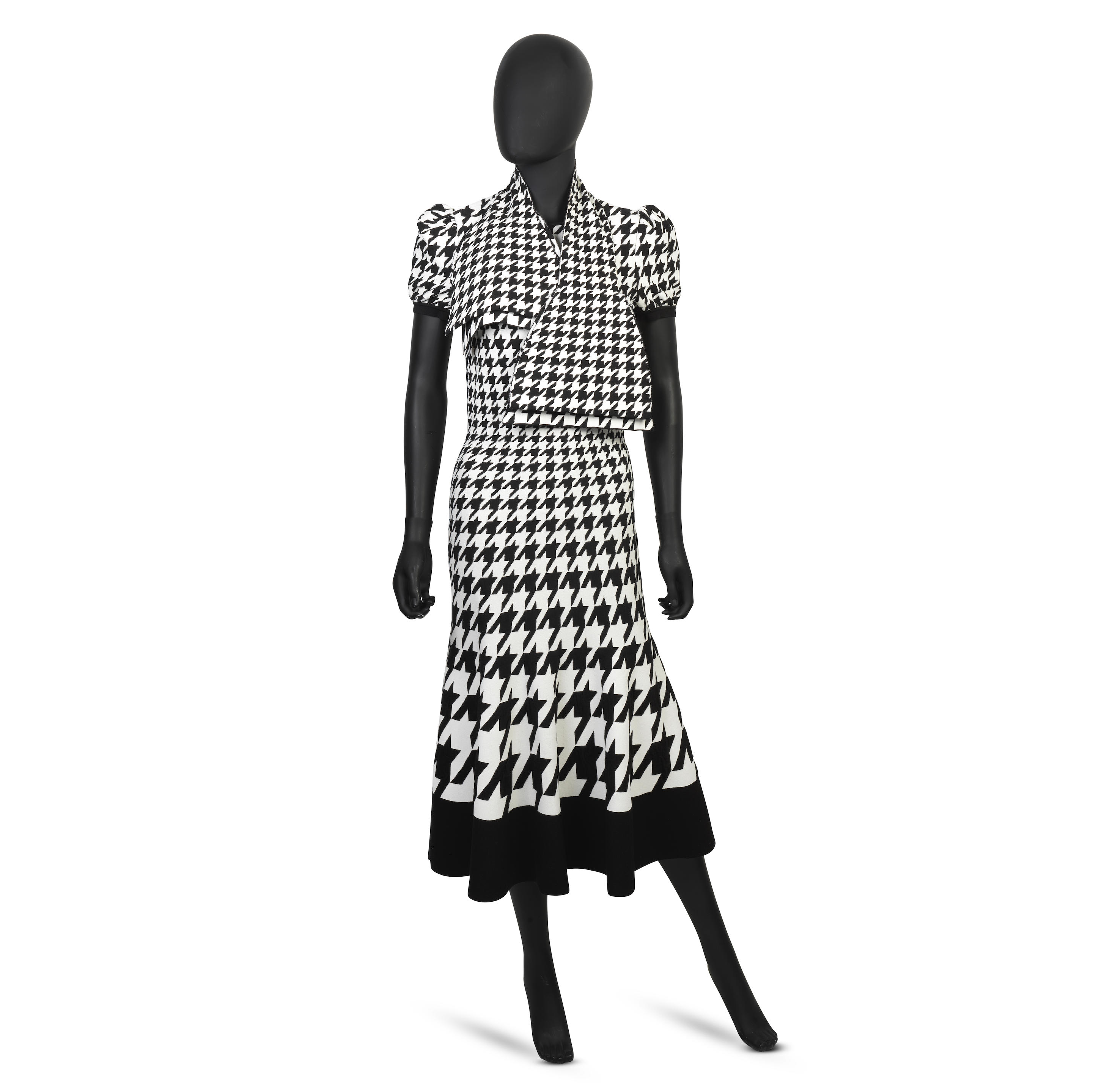 Appraisal: ALEXANDER MCQUEEN A BLACK AND WHITE HOUNDSTOOTH DRESS Black and