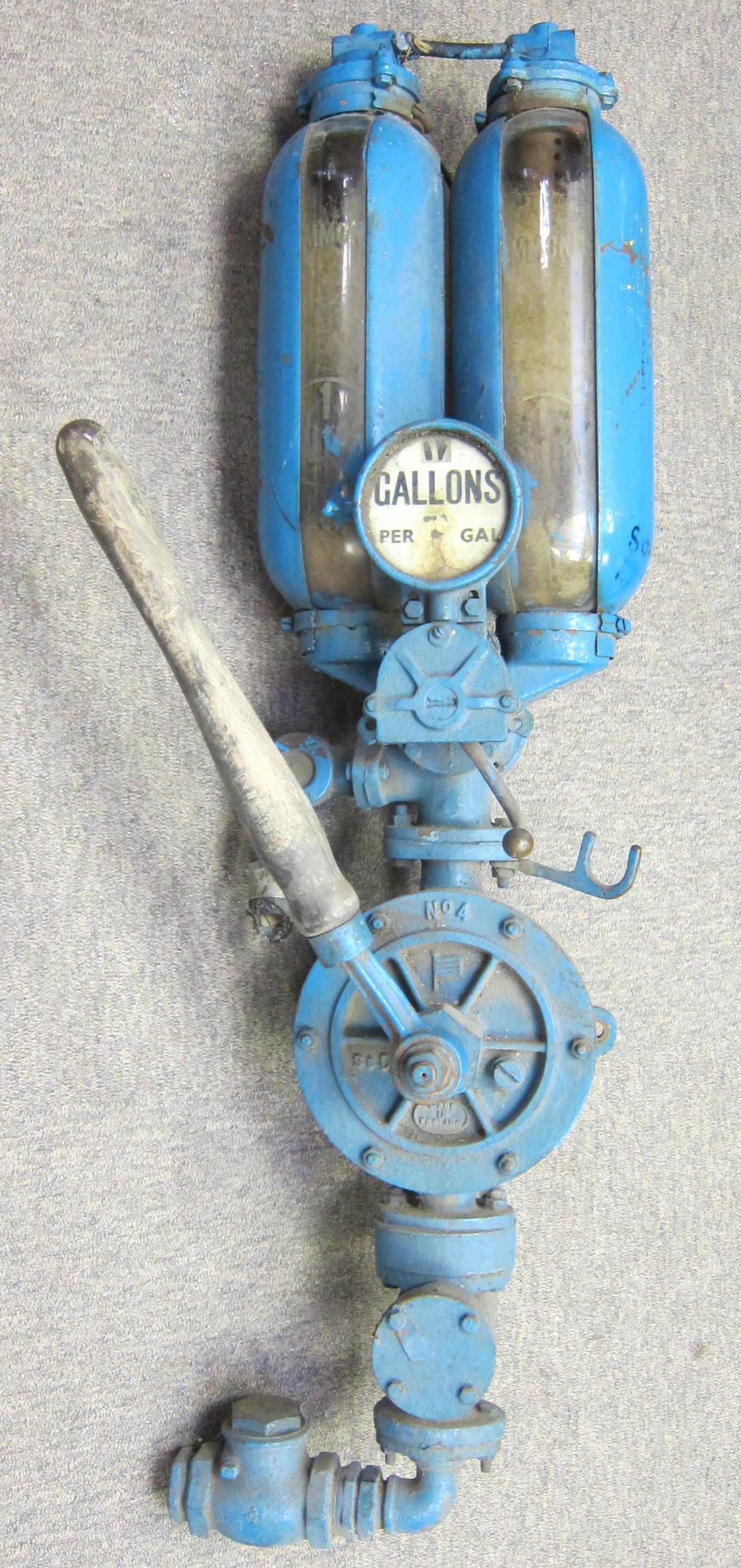 Appraisal: A HAMMOND WALL-MOUNTED TWO-GALLON VISIBLE HAND-OPERATED PETROL PUMP Number dispenser