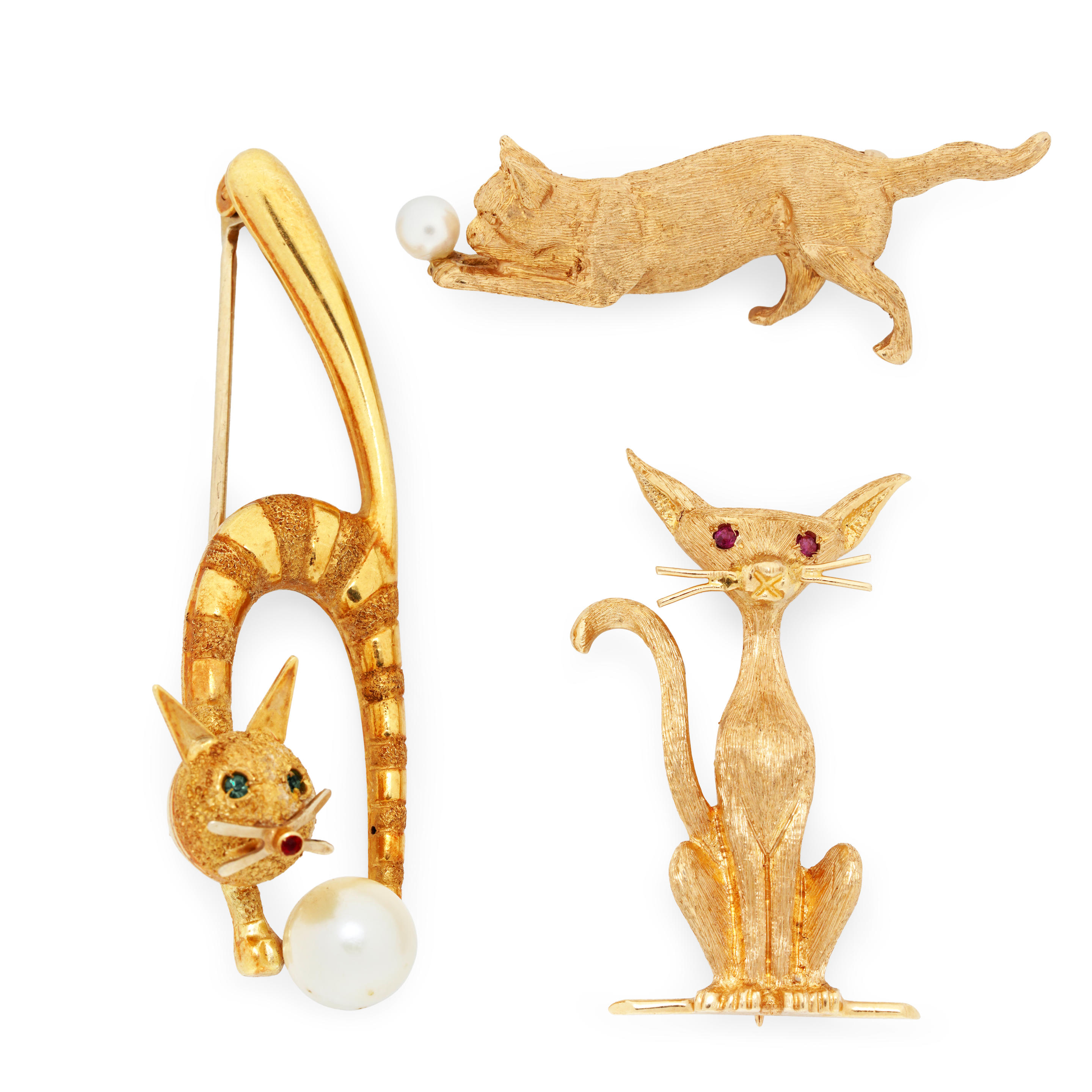 Appraisal: THREE CHARMING GOLD CAT BROOCHES Comprising an k gold striped