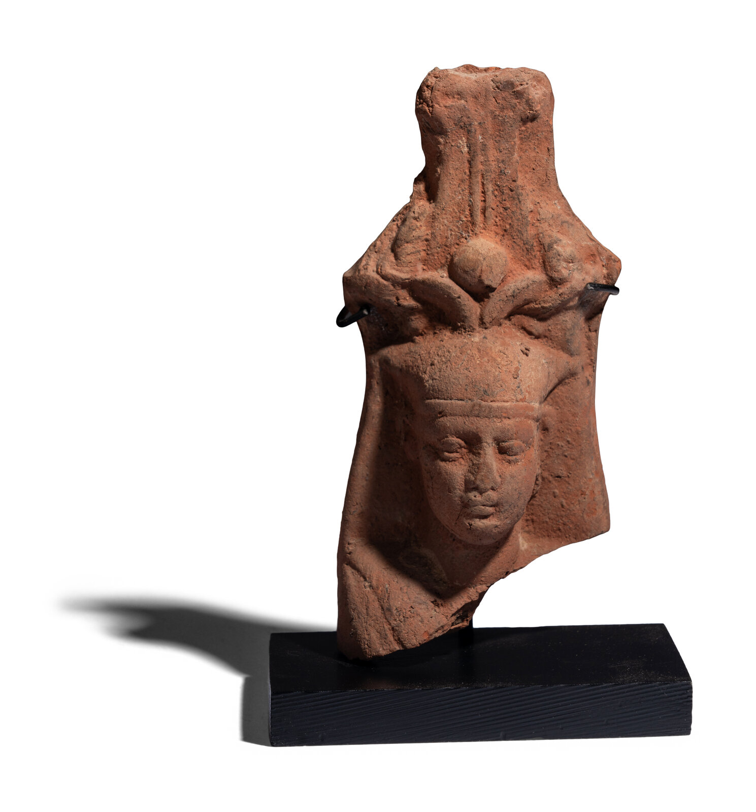 Appraisal: An Egyptian Terracotta Head of the God Osiris Roman Period