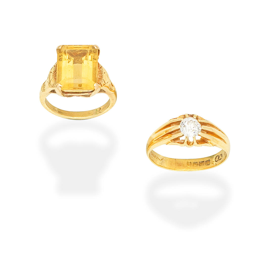 Appraisal: CITRINE RING DIAMOND RING st The step-cut citrine between engraved