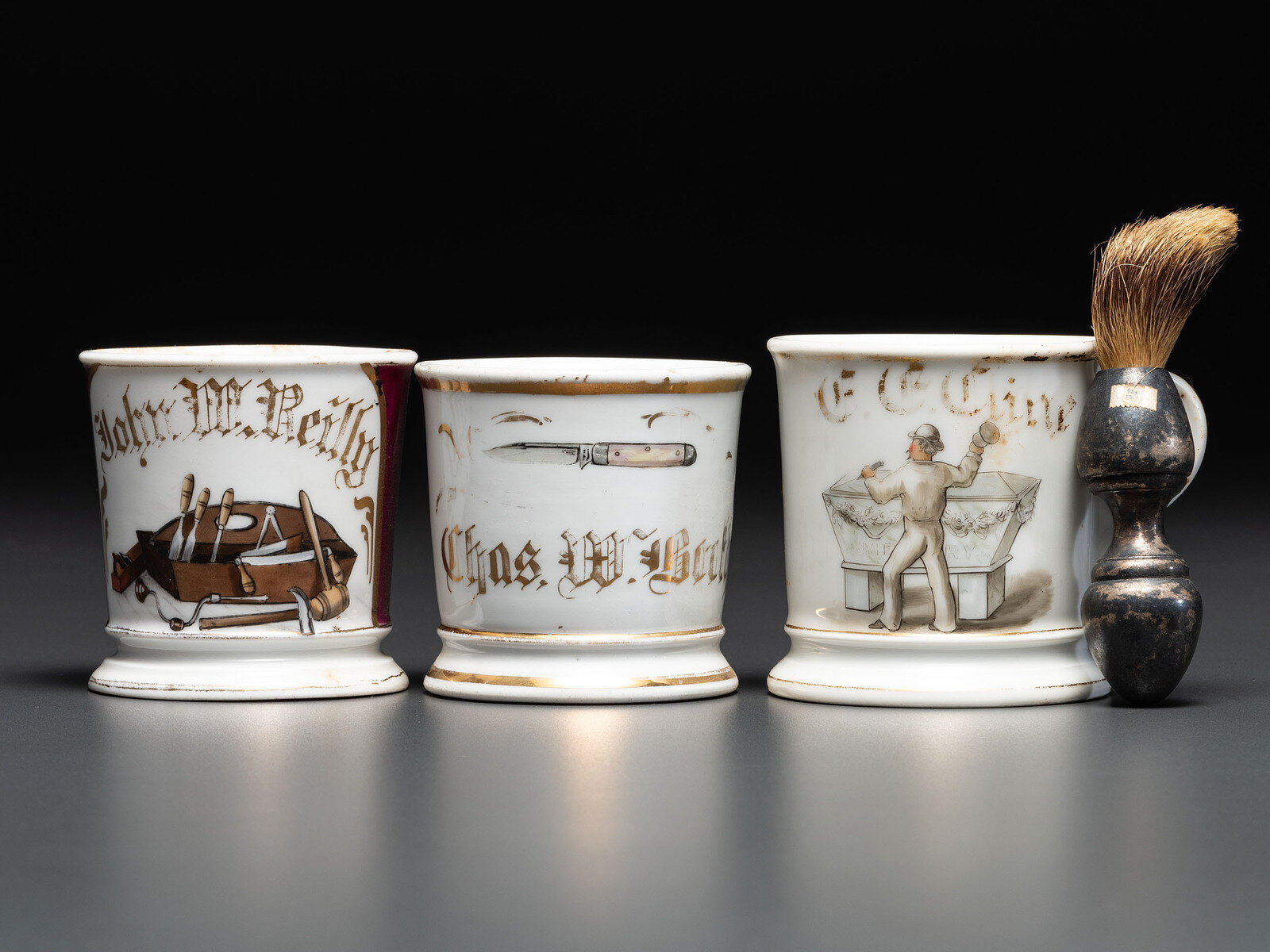 Appraisal: Three Porcelain Occupational Shaving Mugs Late th Early th Century