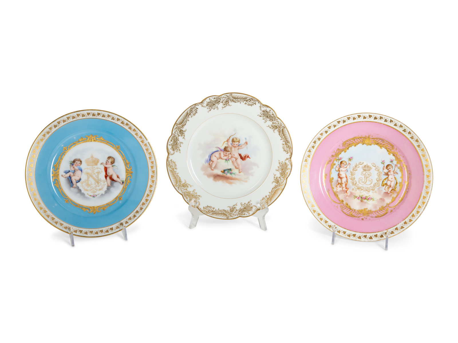 Appraisal: Three S vres Painted and Gilt Porcelain Cabinet Plates French