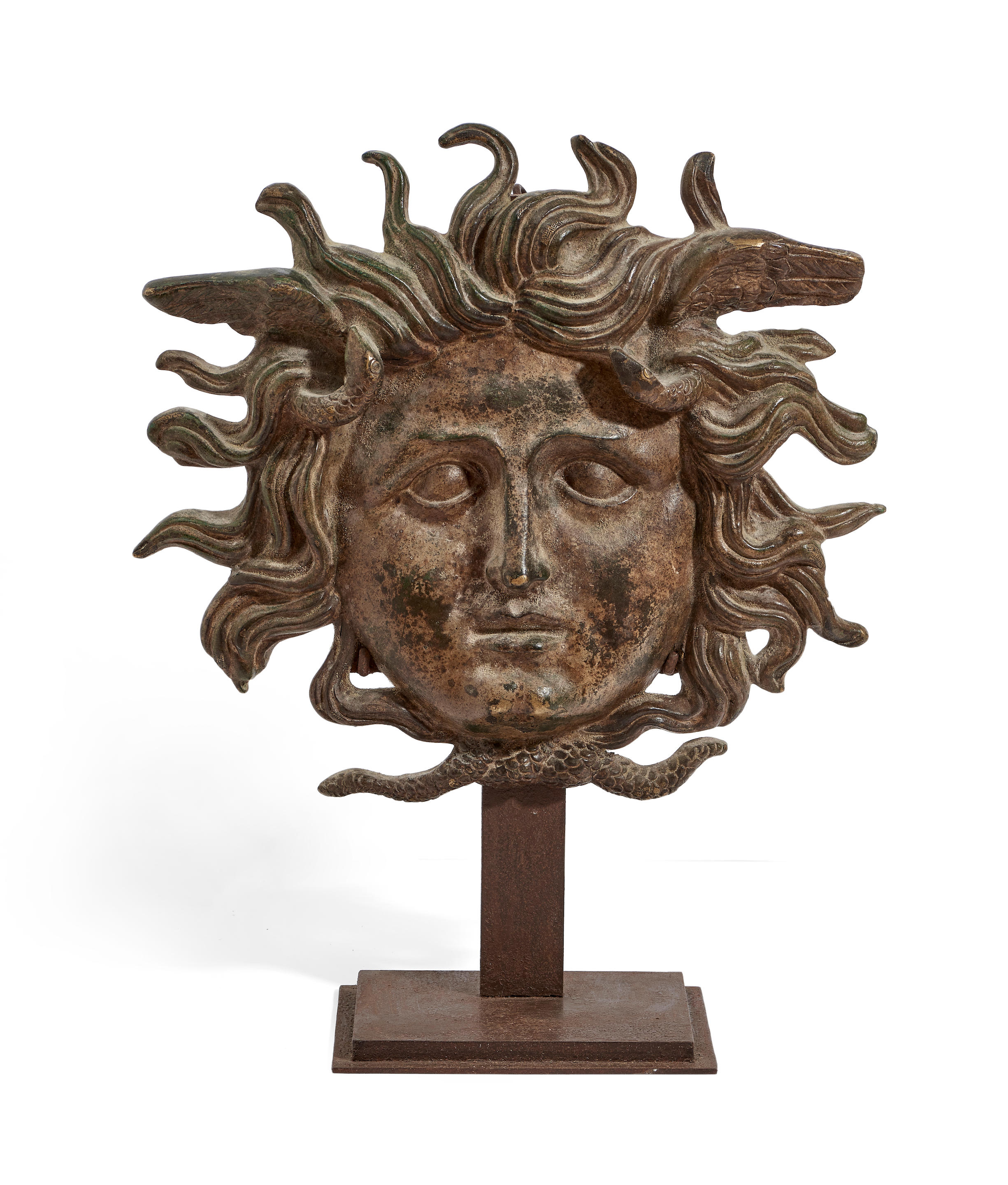 Appraisal: AN ITALIAN PATINATED BRONZE MASK DEPICTING THE HEAD OF MEDUSA