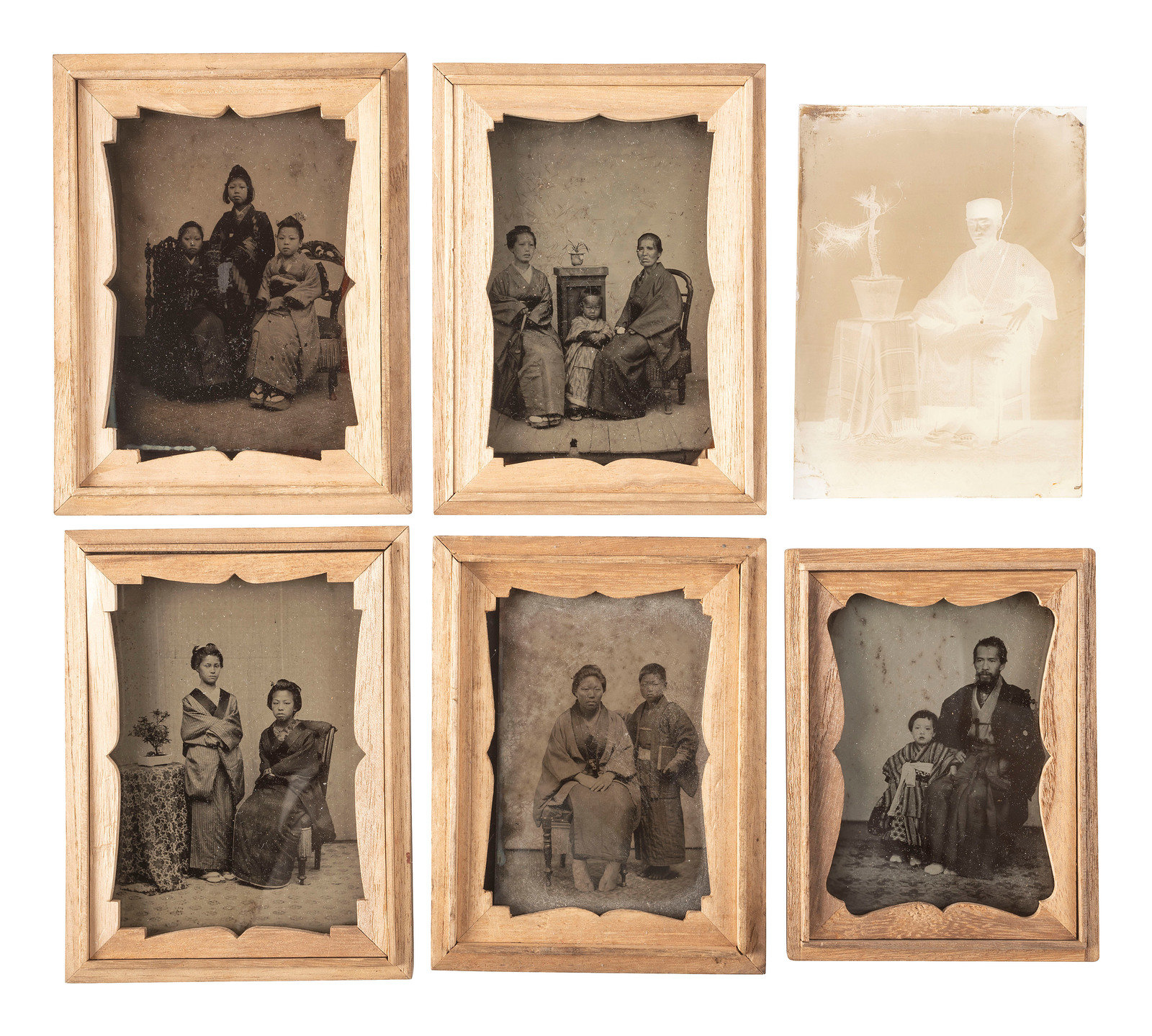 Appraisal: EARLY PHOTOGRAPHY A group of Japanese ambrotypes most housed in