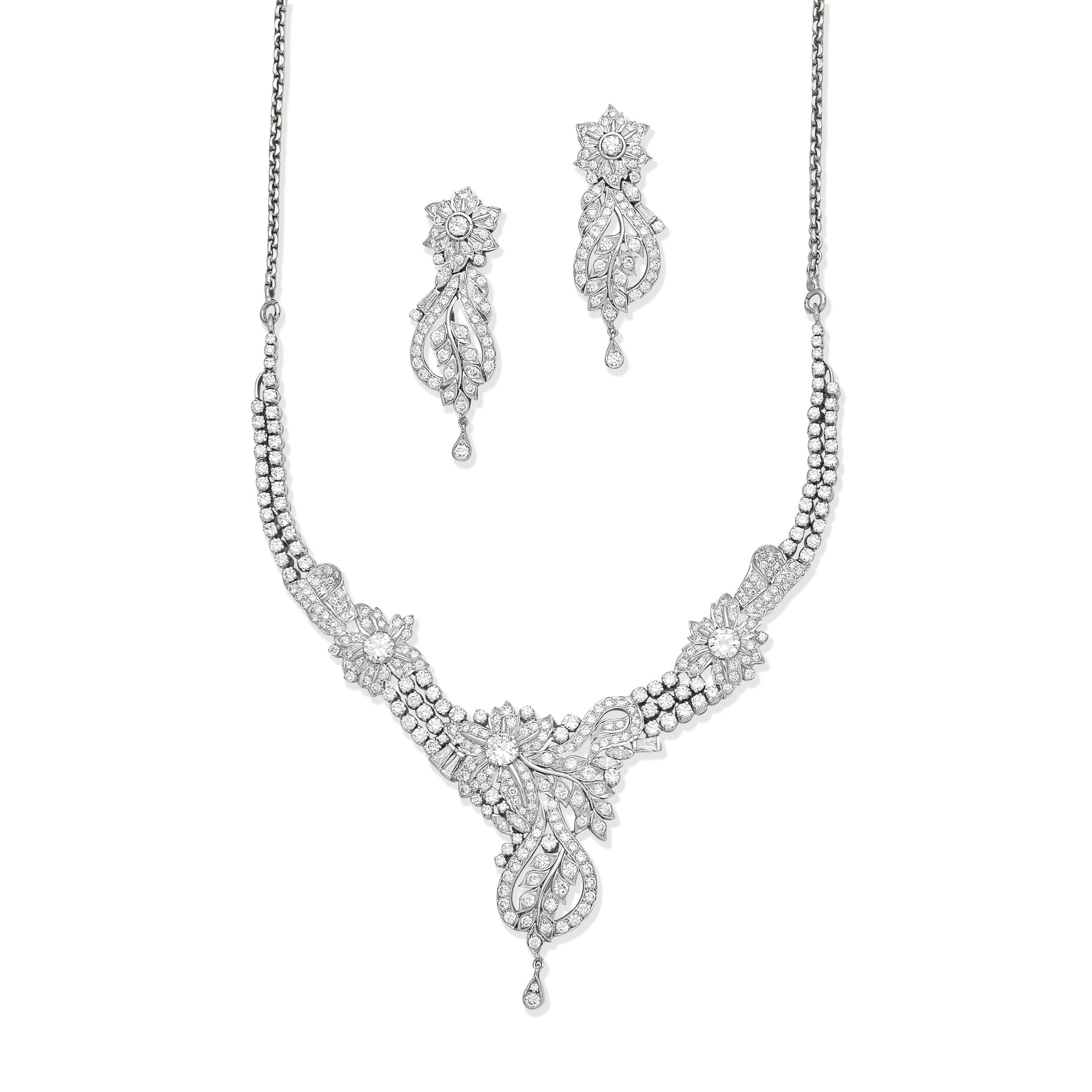 Appraisal: DIAMOND NECKLACE AND PENDENT EARRING SUITE The necklace of foliate