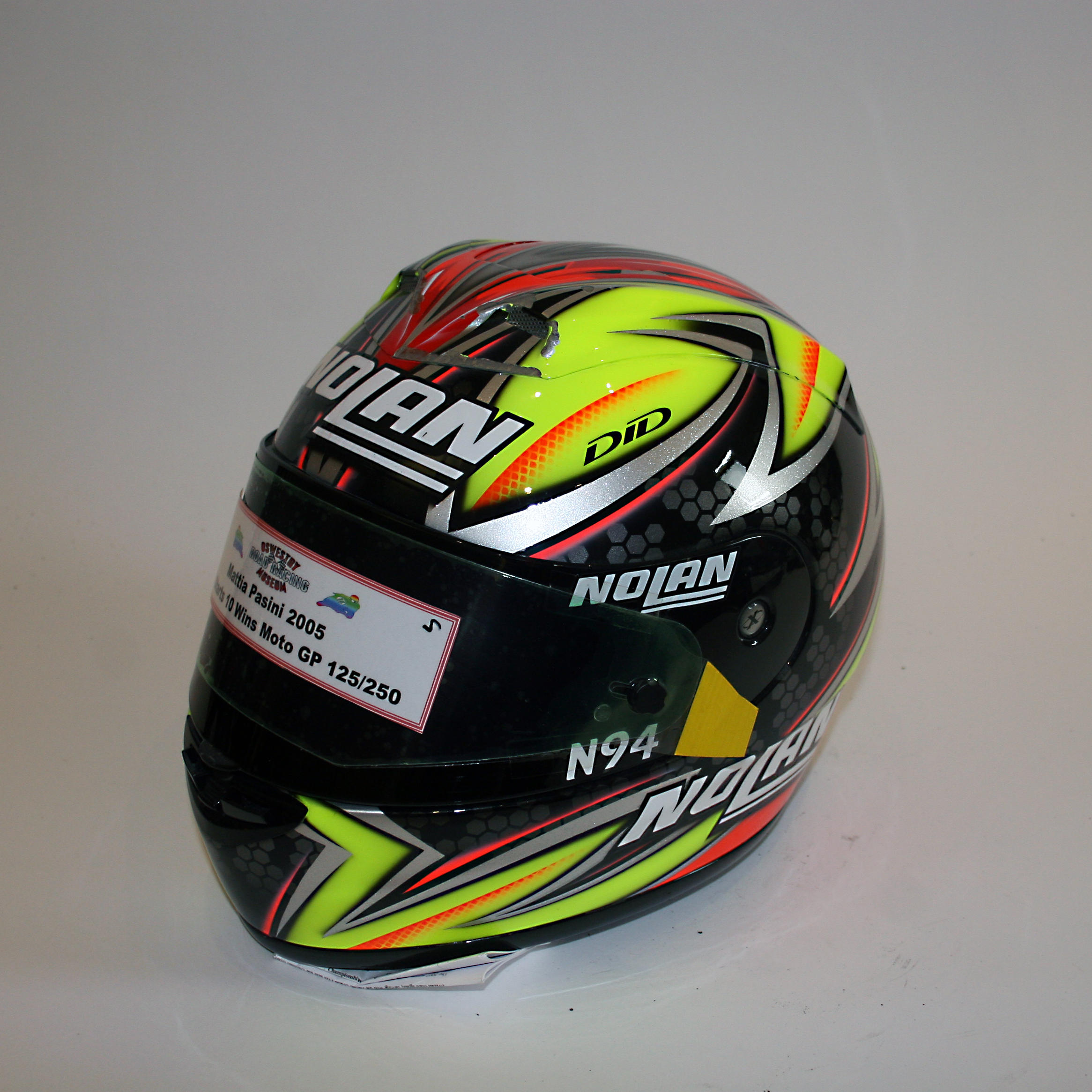 Appraisal: MATTIA PASINI A SIGNED FULL-FACE HELMET BY NOLAN used and