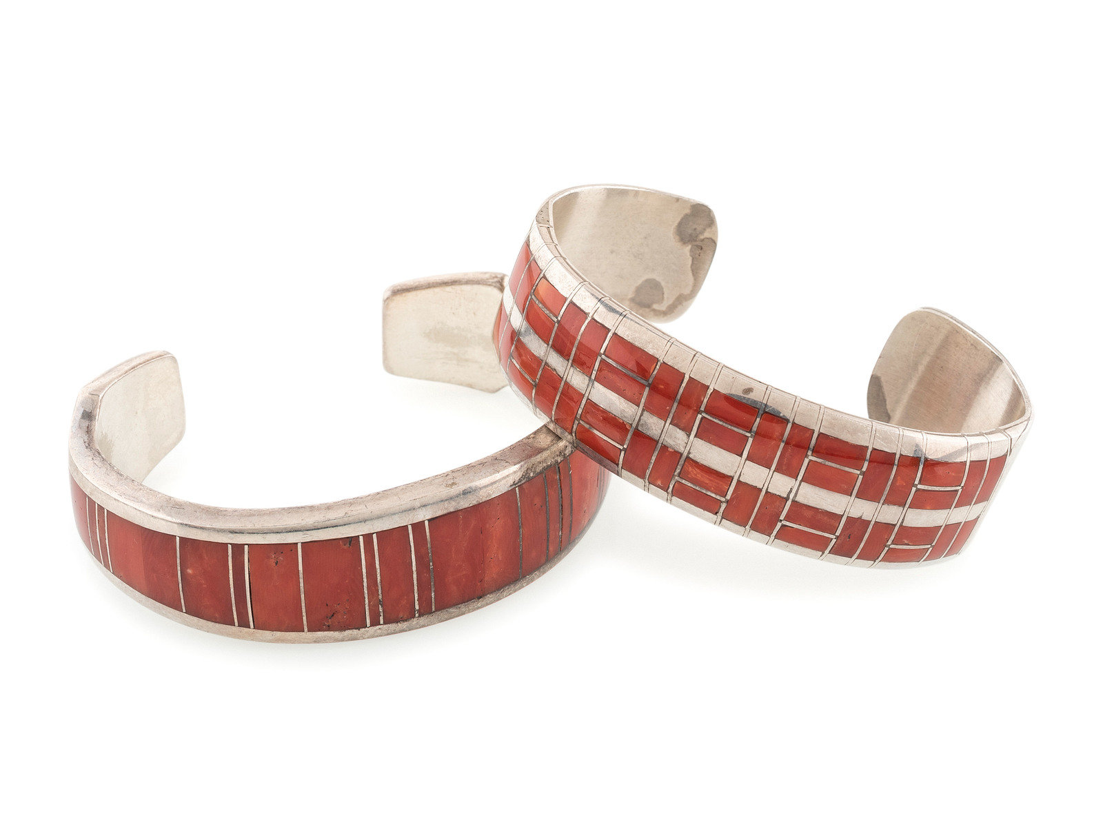 Appraisal: Zuni and Apache Silver and Channel Inlay Coral Cuff Bracelets