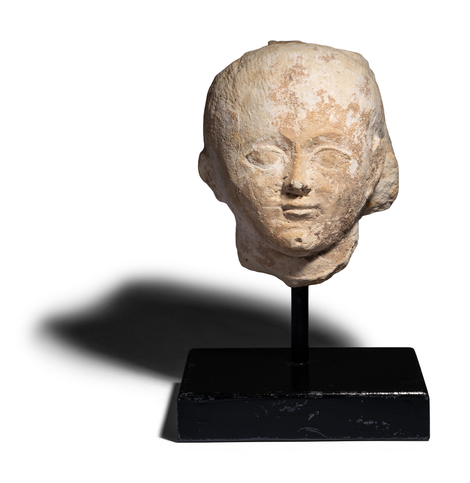 Appraisal: An Egyptian Limestone Head of a Boy Roman Period Circa