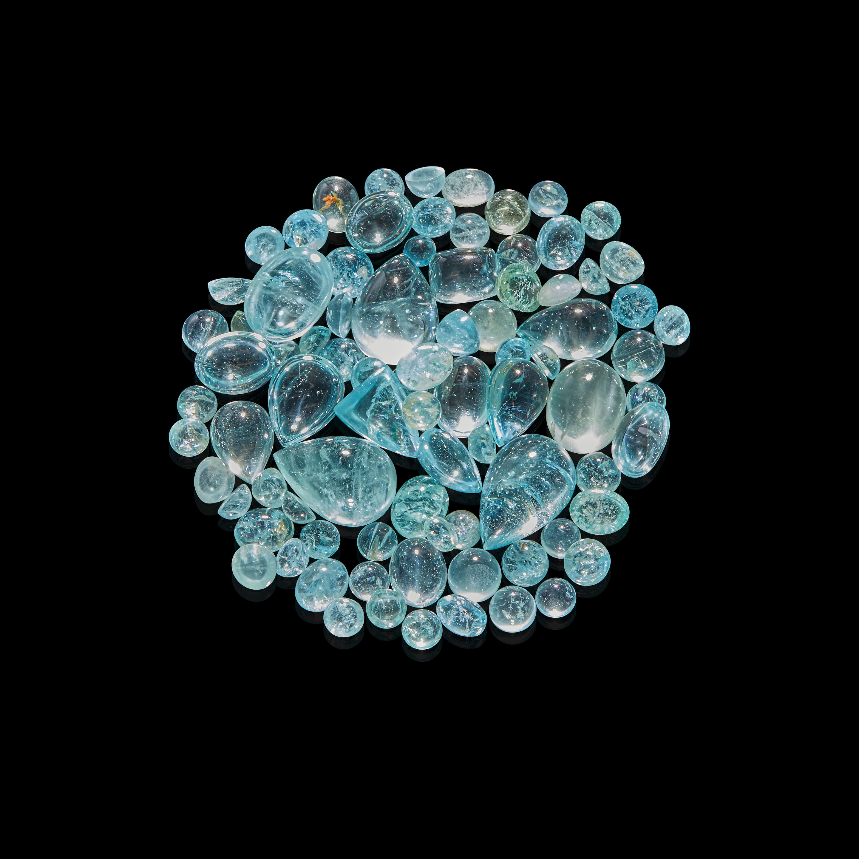 Appraisal: AQUAMARINE CABOCHONS Brazil Comprising oval circular pear-shaped and triangular-shape aquamarine