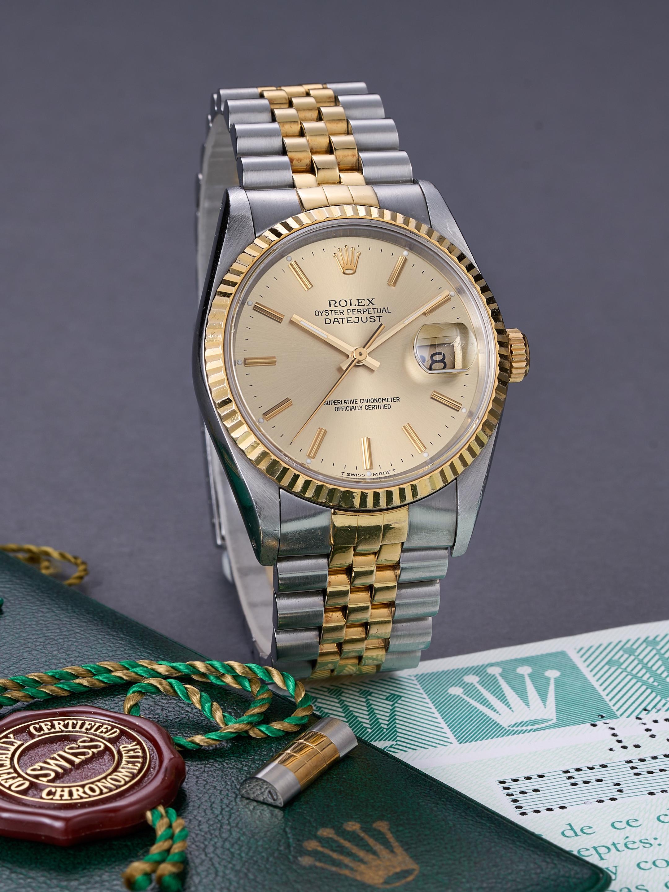 Appraisal: ROLEX DATEJUST REF A YELLOW GOLD AND STAINLESS STEEL BRACELET