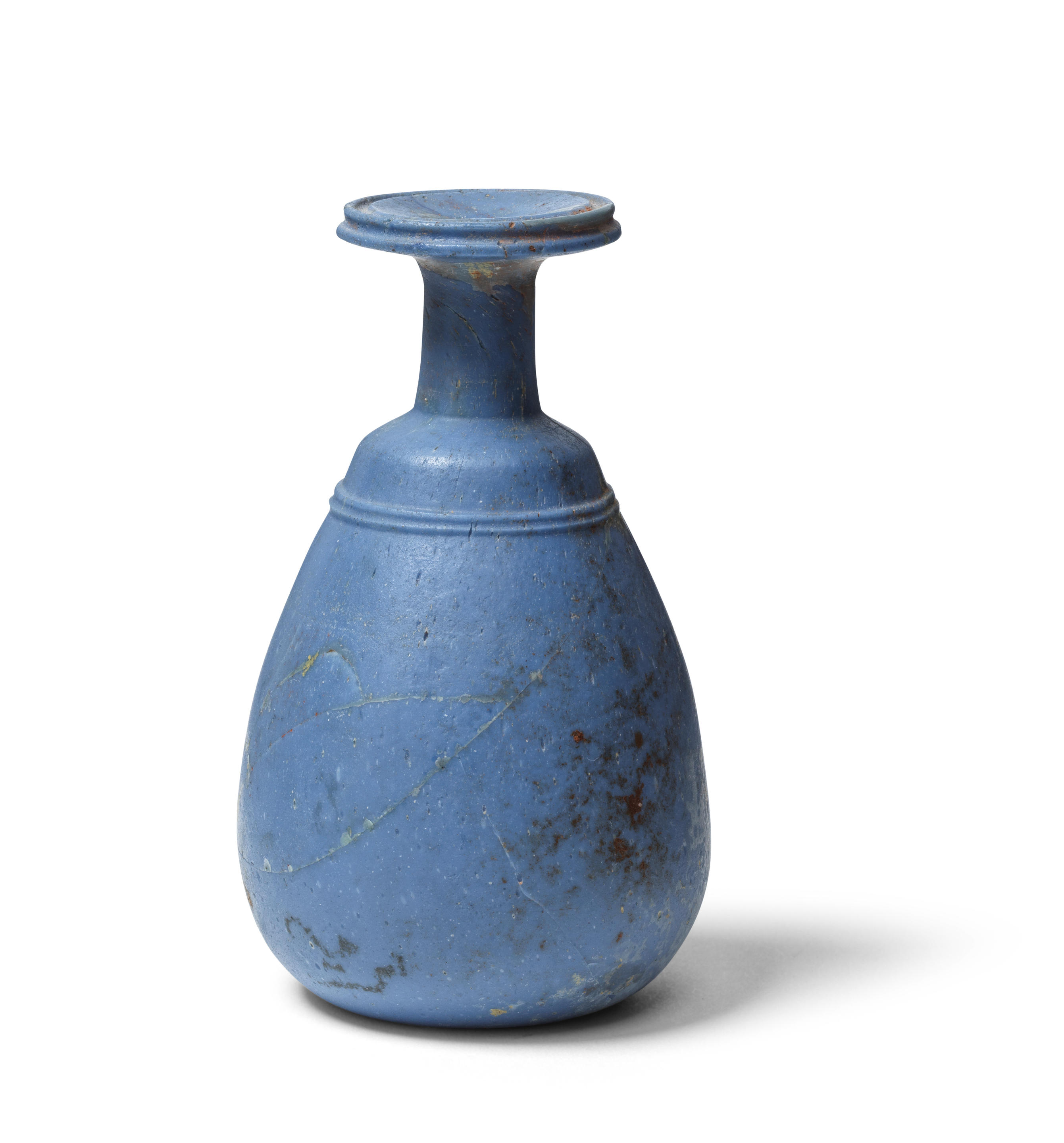 Appraisal: A GREEK OPAQUE PALE BLUE GLASS BOTTLE A Greek opaque